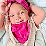 baby, infant, headband, pink, smile, face, eyes, clothing, bib, blanket, lying_down, cute, child, portrait, happy, soft, comfort, baby_girl, closeup, skin