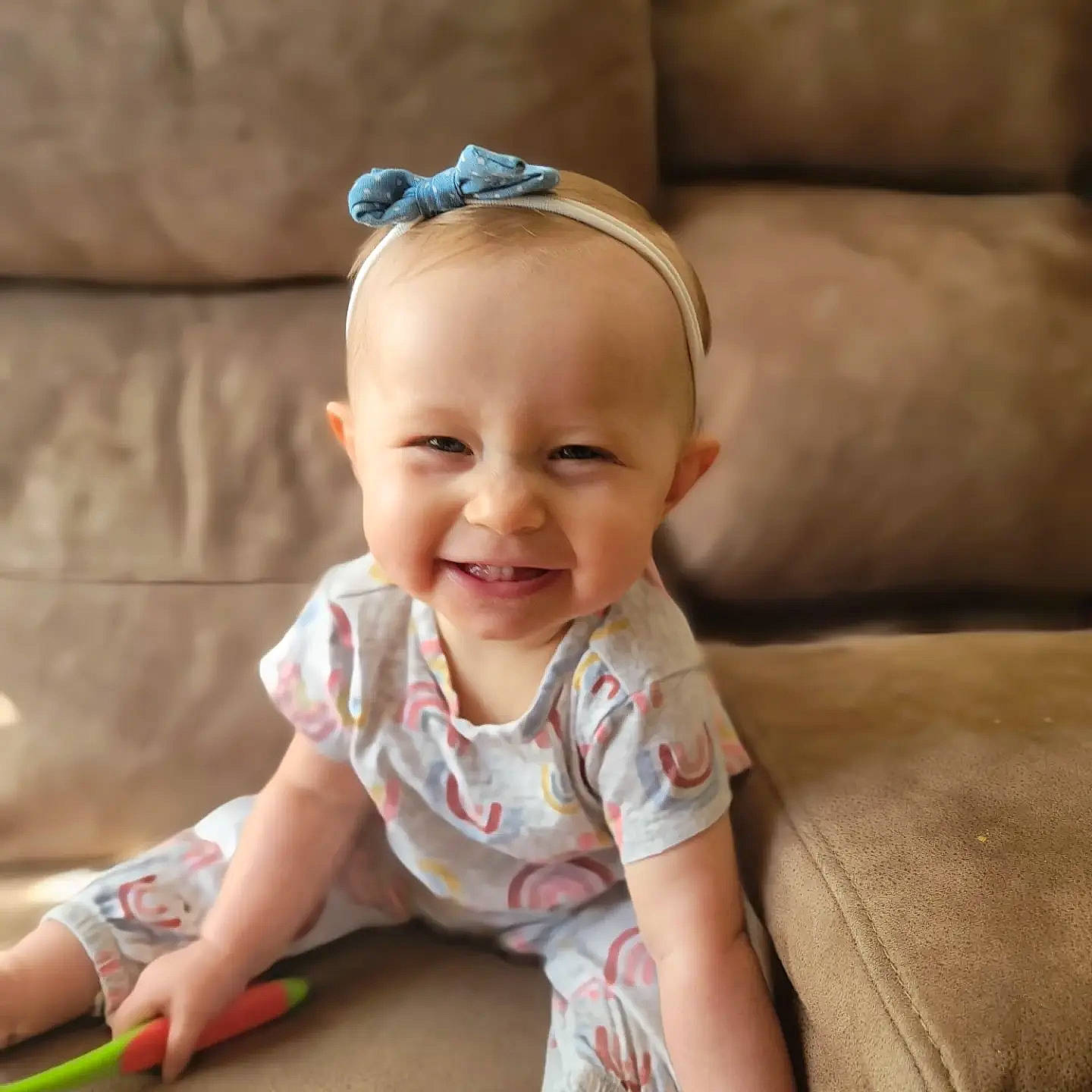 Ember is registered to the contest to win money with this photo: baby, baby_toddler_clothing, child, couch, eye, fashion_accessory, flash_photography, goggles, grass, happy, headband, iris, jewellery, joy, person, photograph, skin, sleeve, smile, sunglasses