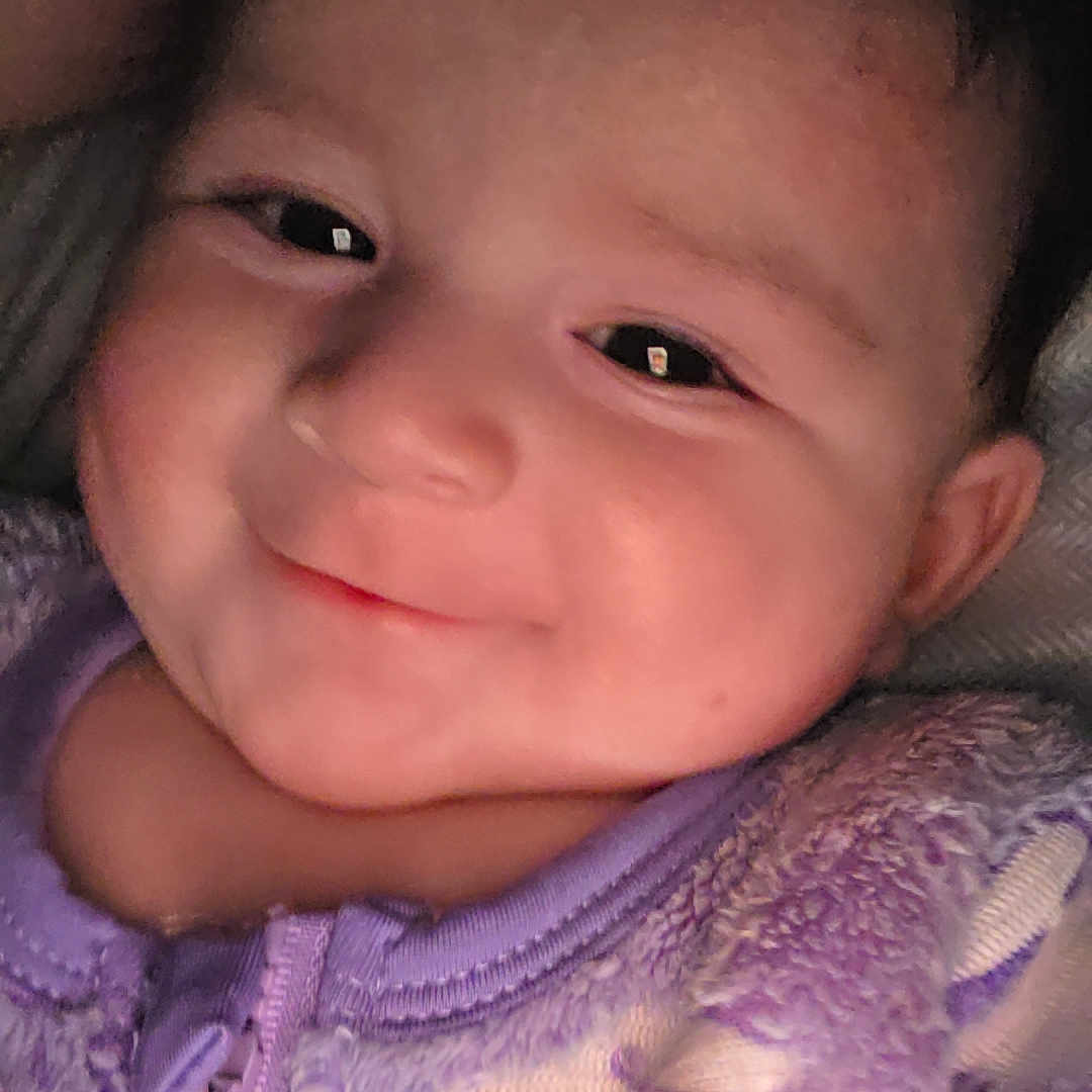 Aries joined the competition — help win amazing prizes! baby, bodypart, bonnet, clothing, face, finger, hand, happy, hat, head, hoodie, knitwear, mouth, newborn, person, photography, portrait, purple, smile, sweater