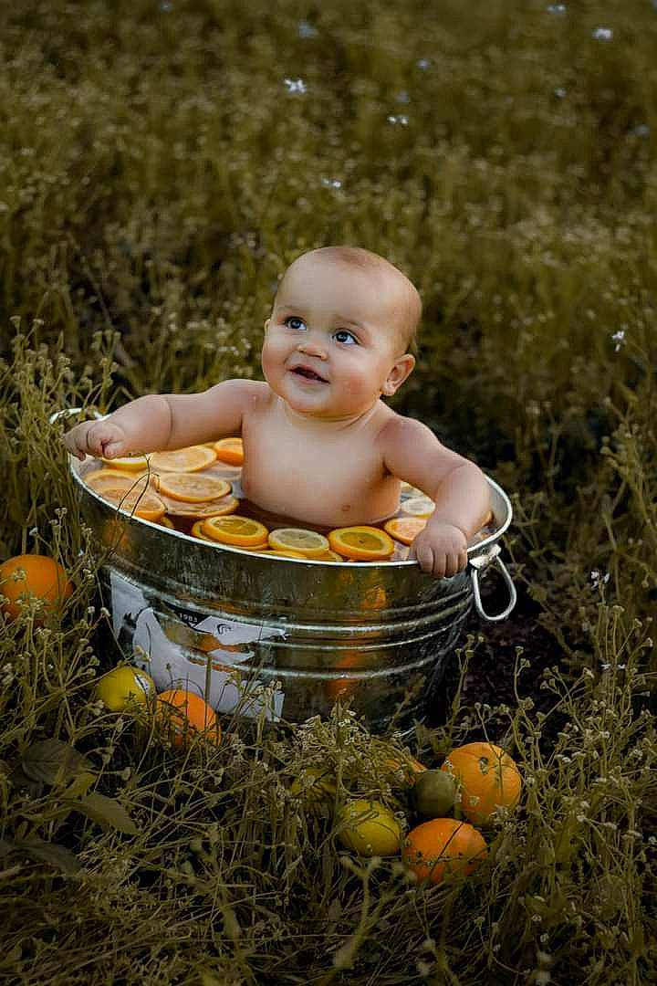 Kaycee joined the competition — help win amazing prizes! baby, baby_products, child, flash_photography, fruit, fun, grass, happy, joy, leisure, natural_foods, people_in_nature, person, plant, recreation, sitting, smile, soil, toddler, toy