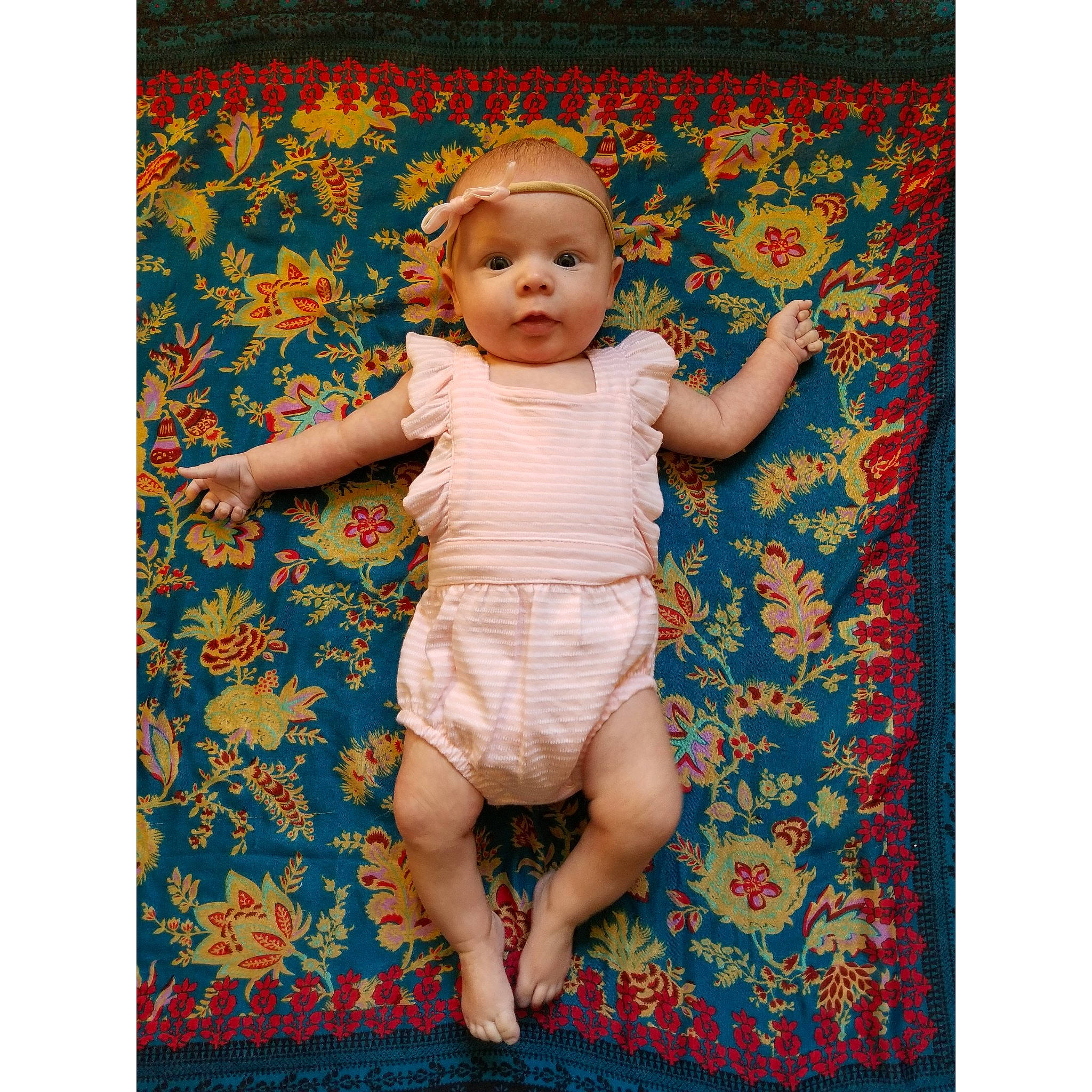Ellayna is registered to the contest to win money with this photo: baby, baby_toddler_clothing, beige, child, child_model, nap_mat, pattern, person, product, textile, toddler, turquoise