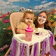 Meadow joined the competition — help win amazing prizes! toddler, child, girl, cake, birthday, cake_smash, frosting, smile, portrait, high_chair, pink_cup, straw, party, flowers, ribbons, decorations, meadow, clouds, indoors, celebration