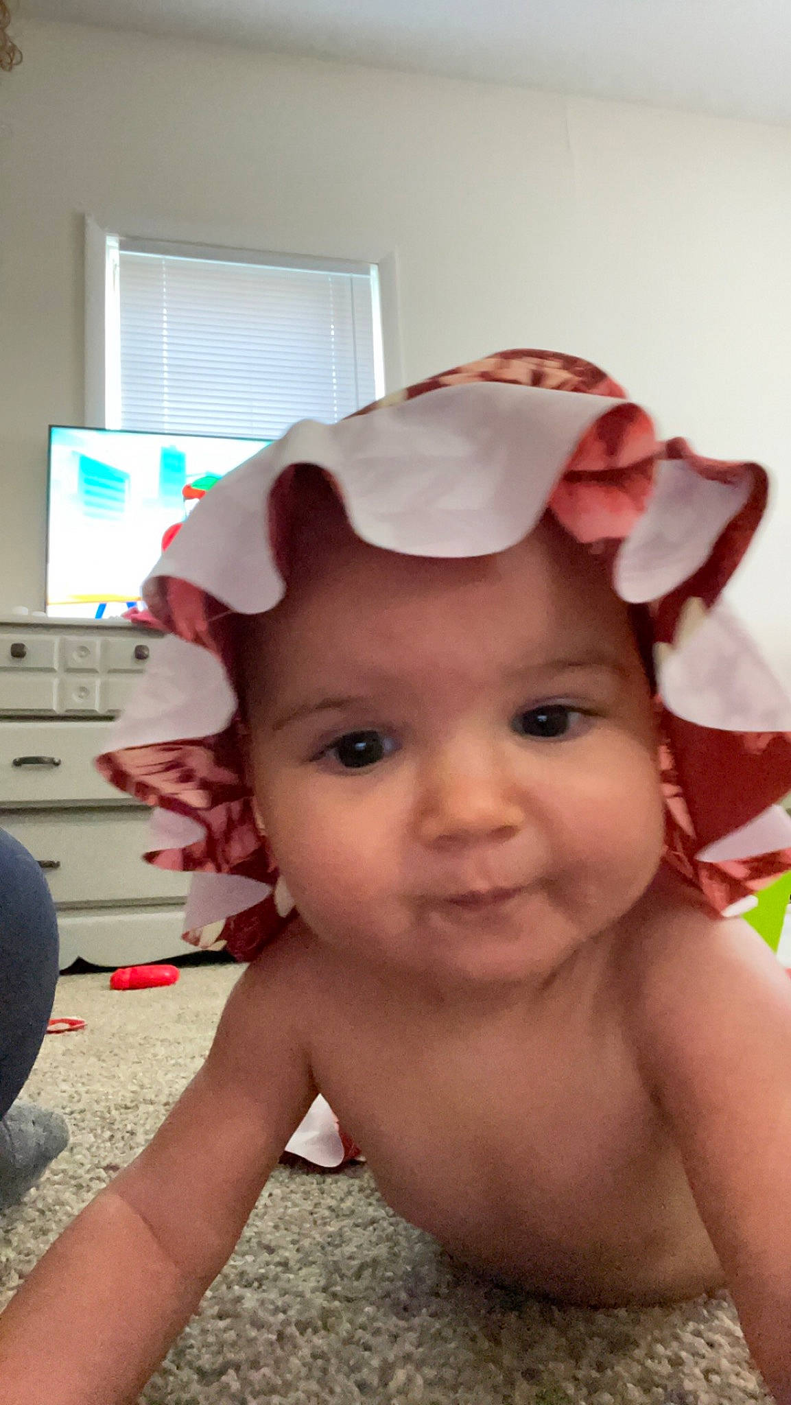 Mazikeen is registered to the contest to win money with this photo: baby, baby_toddler_clothing, cap, cheek, chest, child, fashion_accessory, fun, hair_accessory, happy, headpiece, headwear, human_body, lip, mouth, nose, person, pink, skin, smile