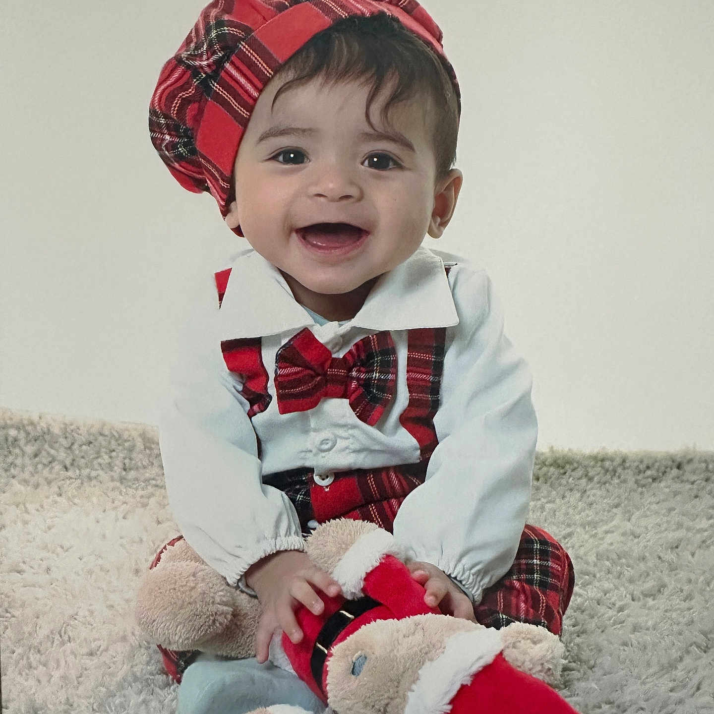 Kaito joined the competition — help win amazing prizes! accessories, baby, cap, clothing, coat, costume, couch, face, formalwear, furniture, happy, hat, head, pants, person, photography, portrait, shirt, sitting, tie