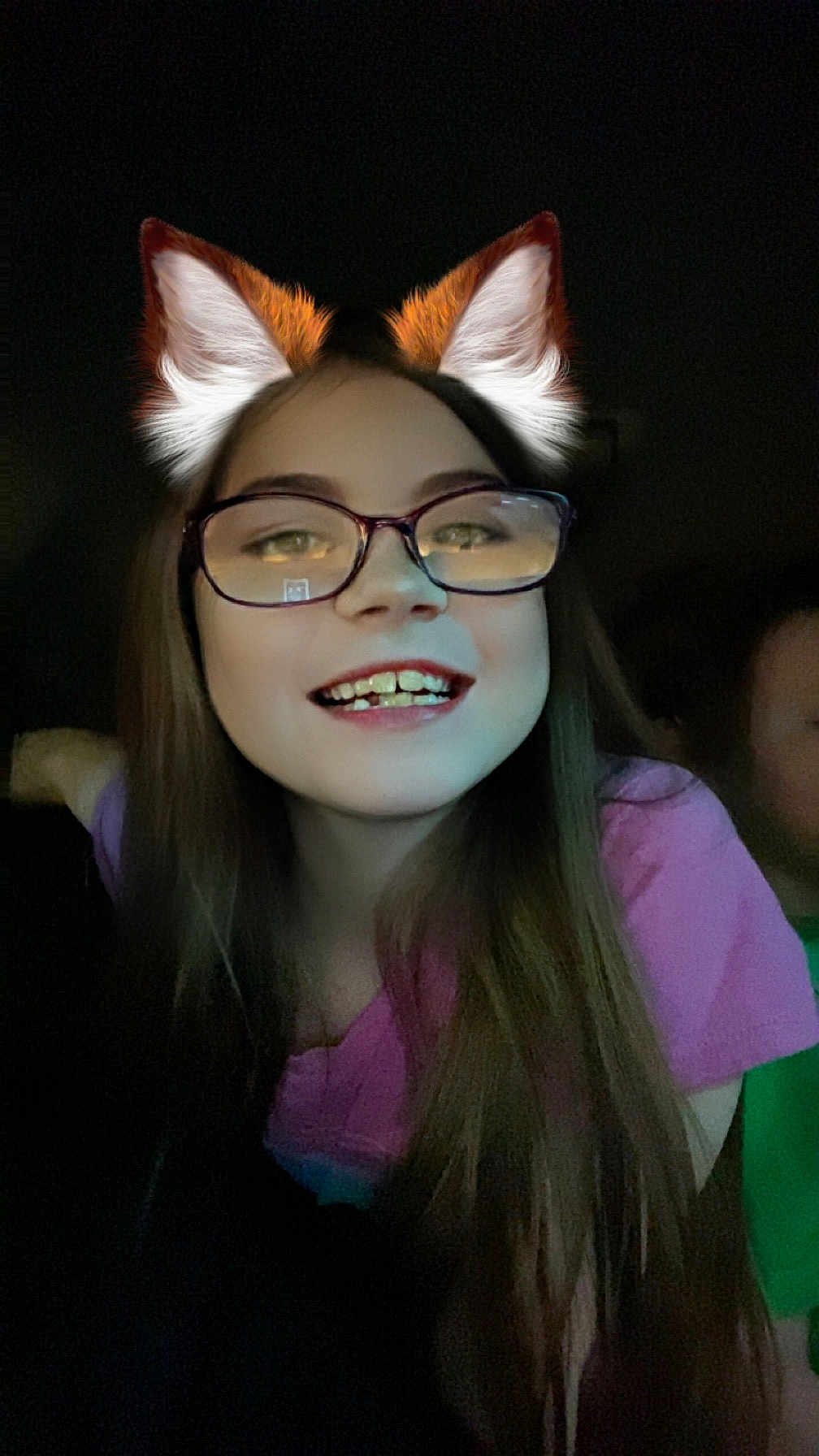 Aaliyah joined the competition — help win amazing prizes! child, girl, glasses, long_hair, smile, teeth, digital_ears, fox_ears, purple_shirt, dark_background, face, portrait, happy, young, person, indoors, closeup, head_and_shoulders, casual, fun