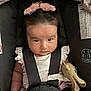 Arely joined the competition — help win amazing prizes! baby, infant, car_seat, child, girl, headband, pink, toy, giraffe_toy, straps, safety, serious_face, clothing, floral_blanket, indoor, portrait, cute, small_hand, graco, restraint