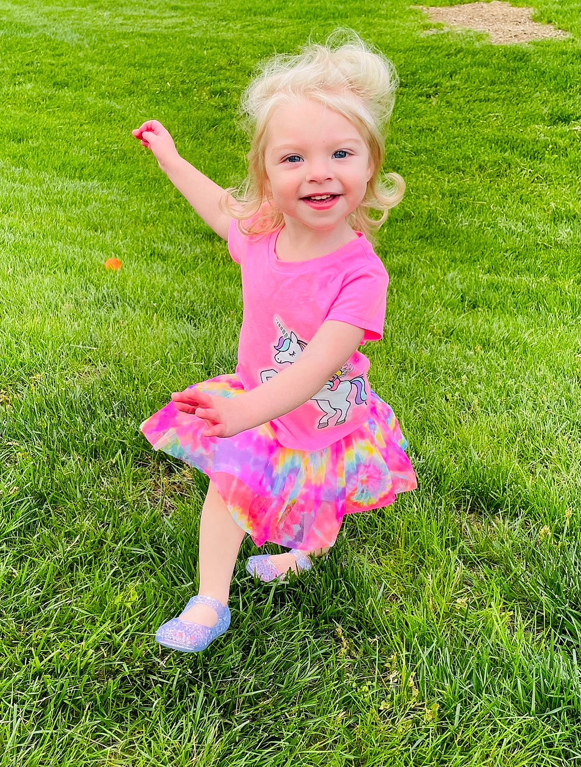 Mercedes is registered to the contest to win money with this photo: baby_toddler_clothing, beauty, child, dress, face, facial_expression, fun, grass, grass_family, grassland, happy, joy, leisure, magenta, meadow, people_in_nature, person, pink, plant, smile