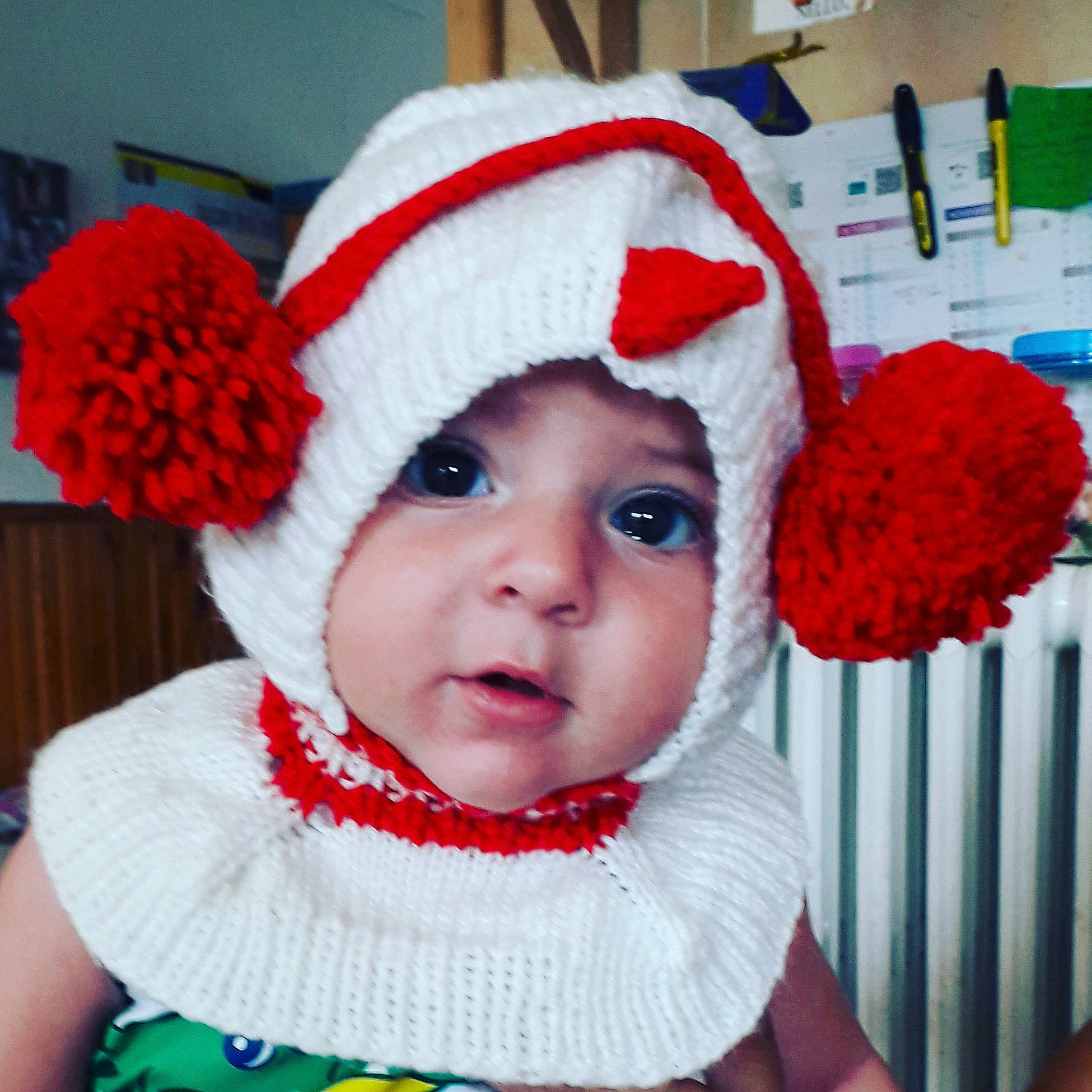 Emrys participe au concours pour gagner de l'argent avec cette photo : baby, beanie, bonnet, cap, child, clothing, costume, costume_accessory, costume_hat, crochet, ear, fashion_accessory, fur, hat, headgear, headwear, knit_cap, person, red, toddler