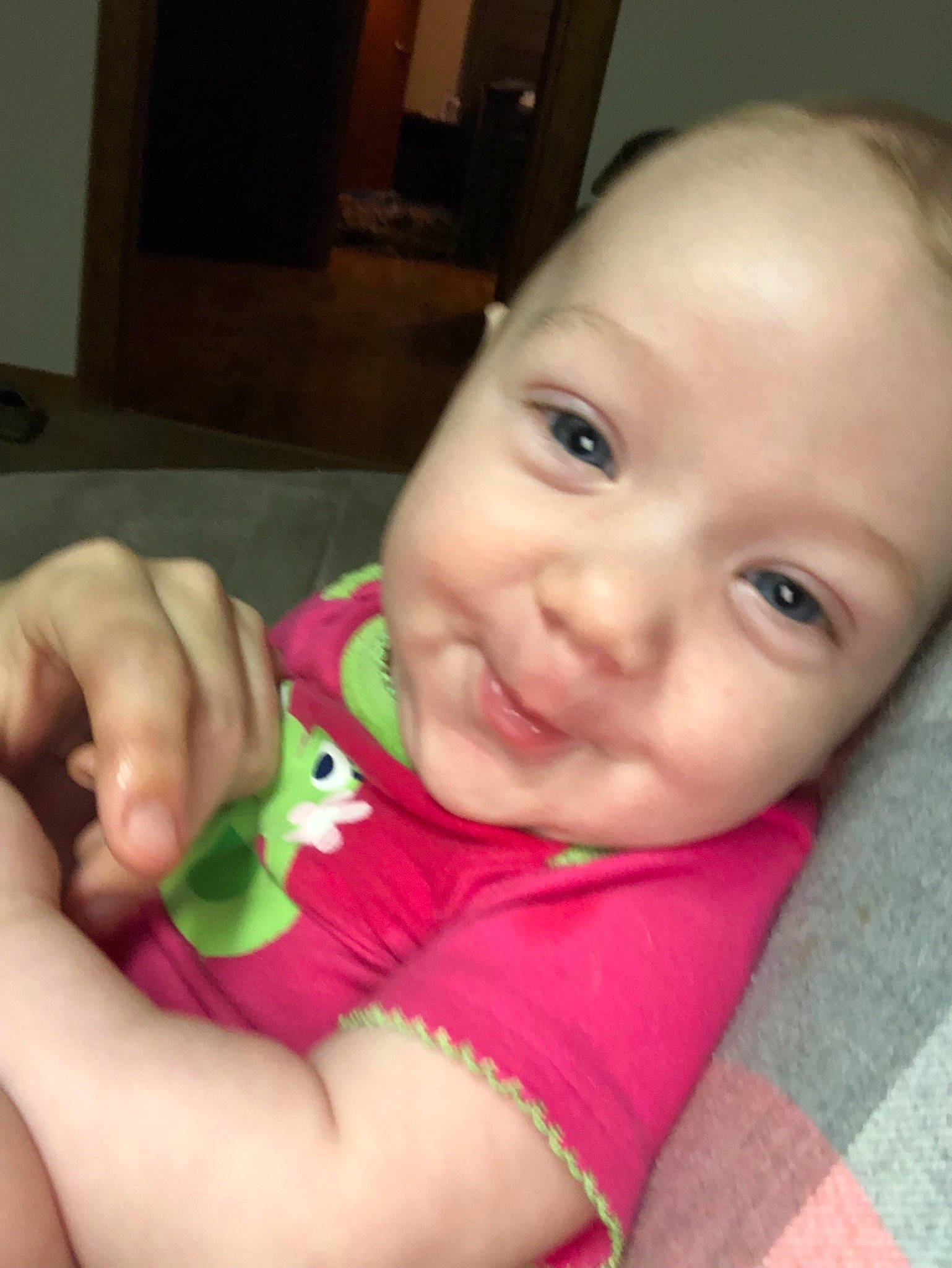 Elana is registered to the contest to win money with this photo: baby, cheek, child, ear, eye, face, finger, hand, head, lip, mouth, nail, nose, person, pink, skin, smile, thumb, toddler