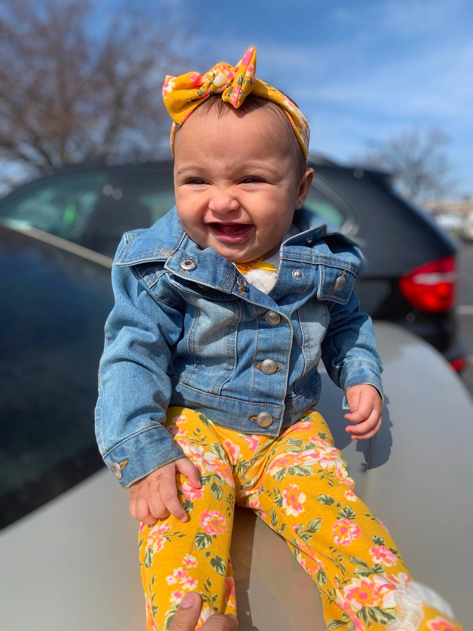 Ameena is registered to the contest to win money with this photo: baby, baby_toddler_clothing, electric_blue, eye, face, fun, grass, happy, head, iris, jacket, leisure, person, skin, sky, sleeve, smile, street_fashion, t_shirt, toddler