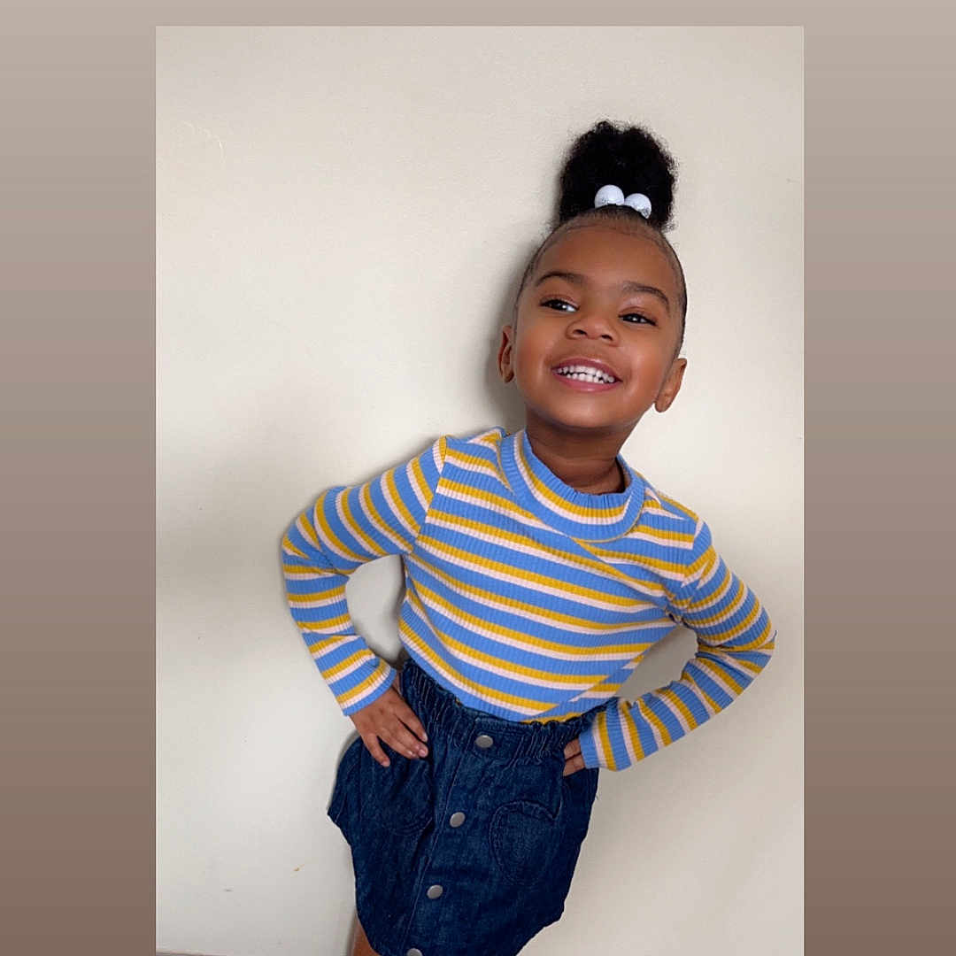 Khari joined the competition — help win amazing prizes! child, clothing, face, female, footwear, girl, happy, head, jeans, knitwear, longsleeve, pants, person, photography, portrait, shoe, skirt, sleeve, smile, sweater