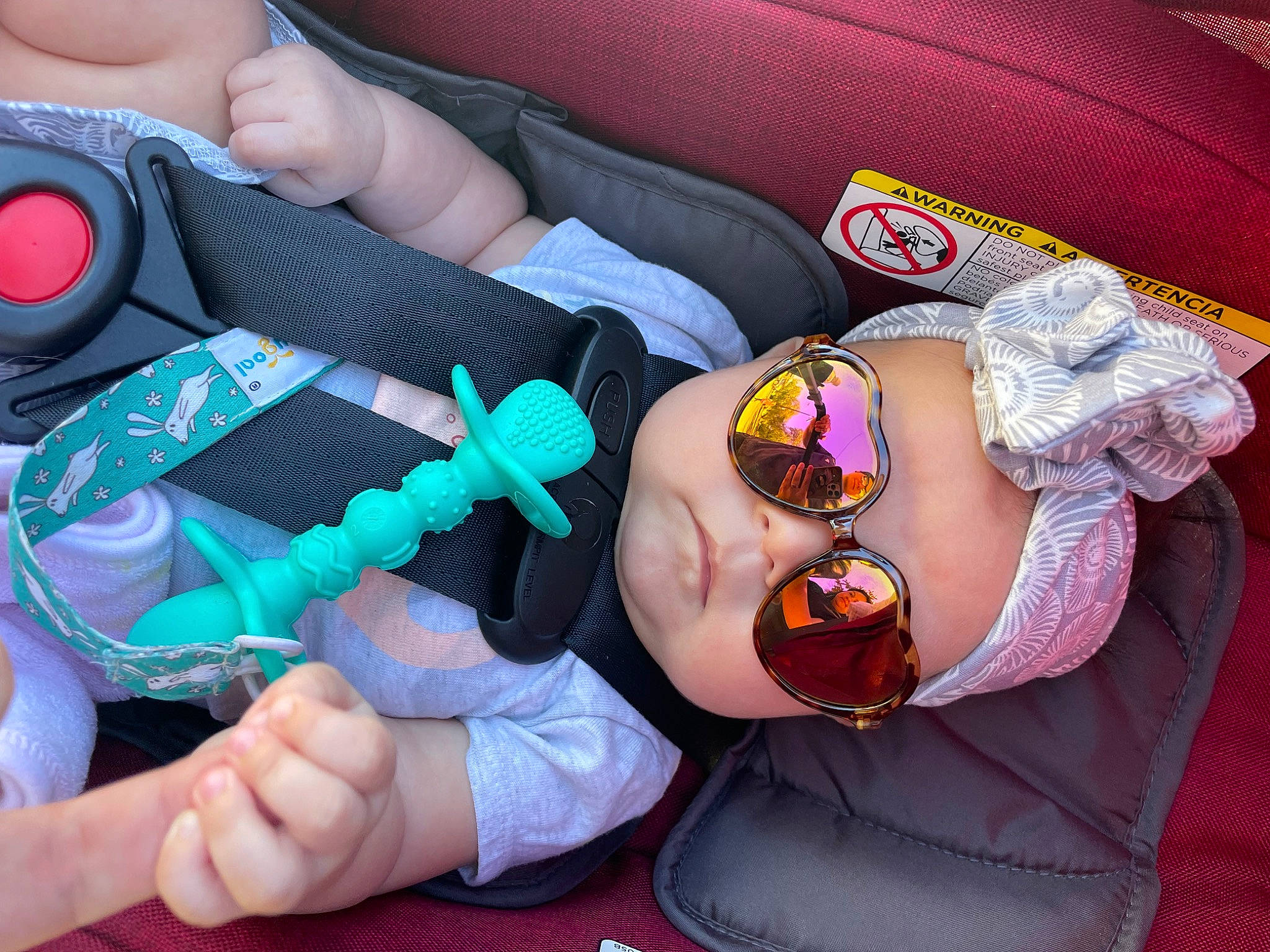 Anastasia is registered to the contest to win money with this photo: arm, baby, baby_products, baby_toddler_clothing, child, comfort, finger, hand, headwear, human_body, joint, knee, lap, leg, mouth, nail, person, textile, thigh, thumb