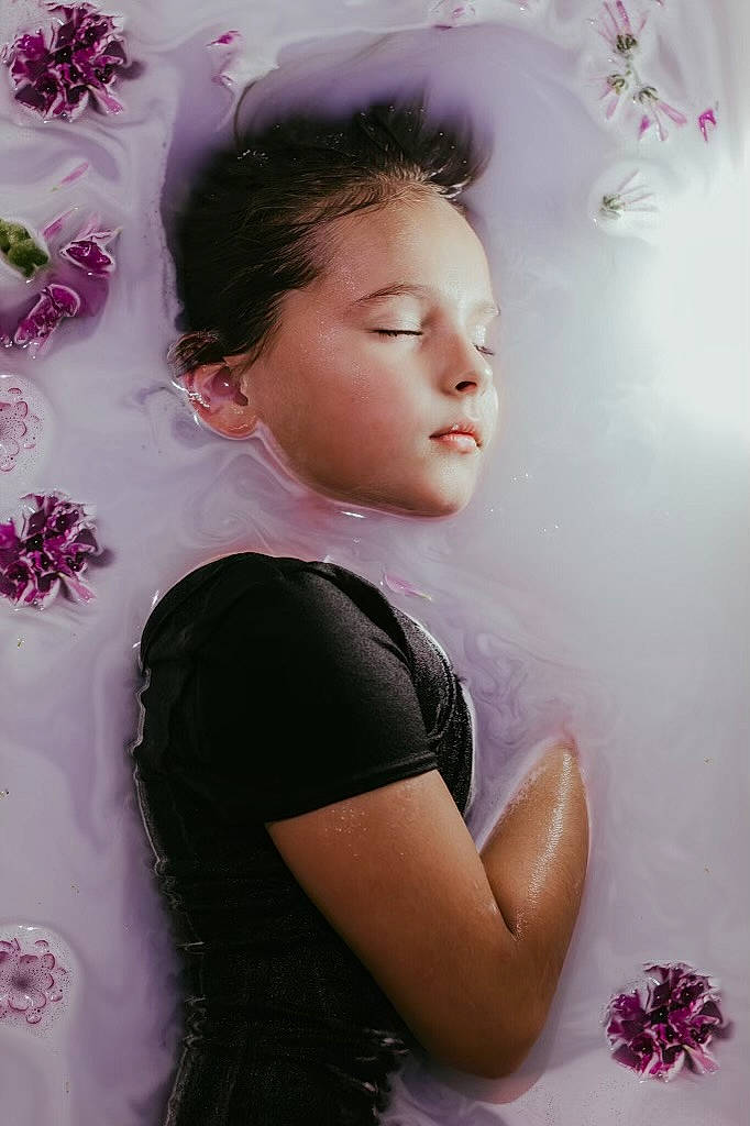 Ellee is registered to the contest to win money with this photo: bridal_accessory, brown_hair, dress, eyelash, fashion_design, flash_photography, hairstyle, happy, headpiece, lip, long_hair, magenta, neck, person, petal, pink, plant, shoulder, skin, textile