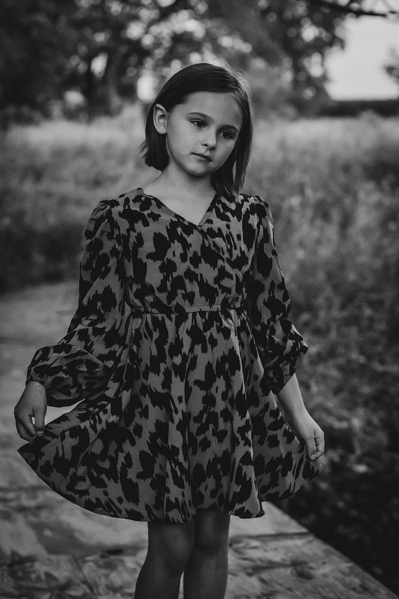 Ellee is registered to the contest to win money with this photo: black_and_white, black_hair, day_dress, dress, eye, face, fashion_design, flash_photography, grass, grey, hairstyle, happy, lip, one_piece_garment, person, plant, sleeve, standing, style, thigh