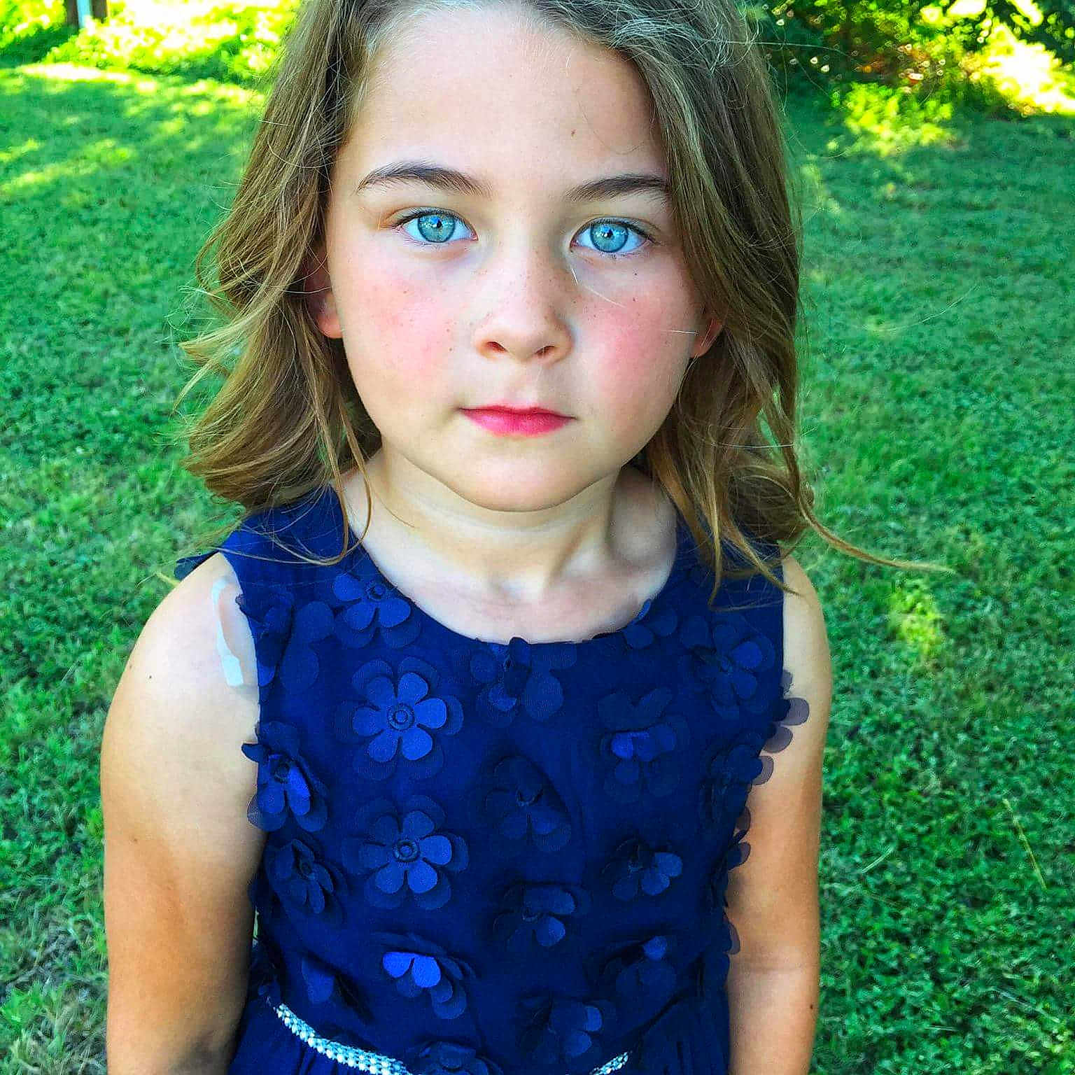 Kirra is registered to the contest to win money with this photo: beauty, black_hair, blond, brown_hair, child, child_model, dress, eye, girl, grass, hairstyle, head, human_hair_color, long_hair, person, photo_shoot, portrait, portrait_photography, skin, smile