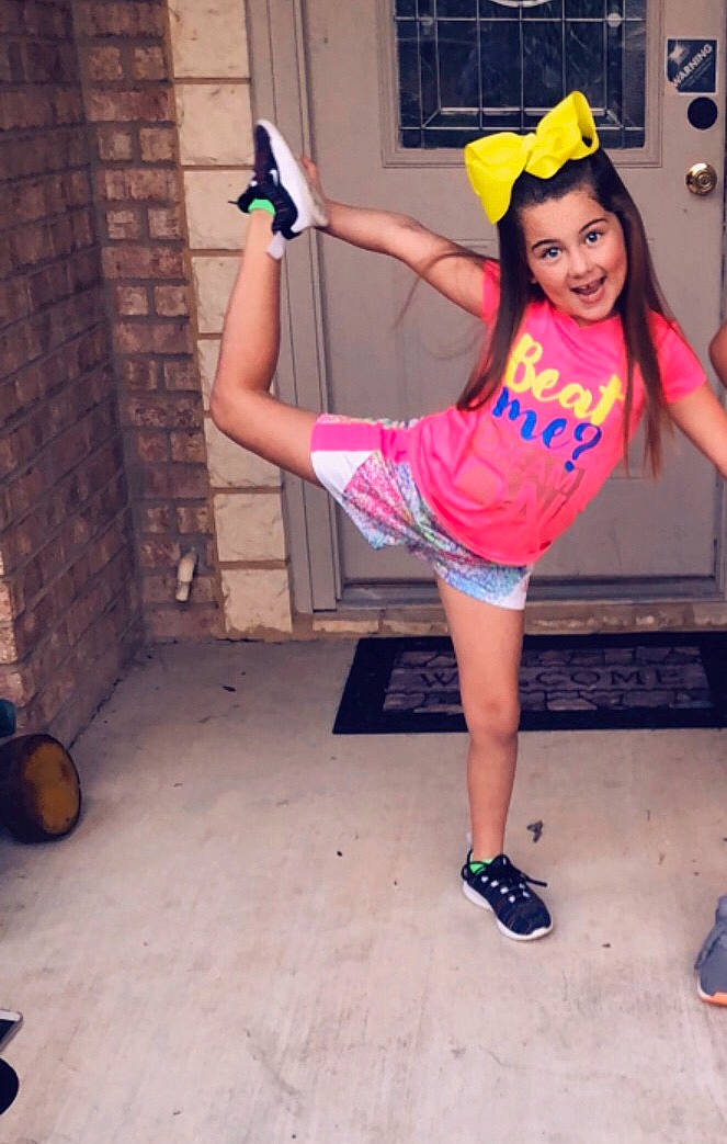 Kirra is registered to the contest to win money with this photo: abdomen, arm, clothing, costume, fashion_accessory, footwear, fun, girl, headgear, human_body, joint, joy, leg, pattern, person, shoe, shoulder, thigh, trunk