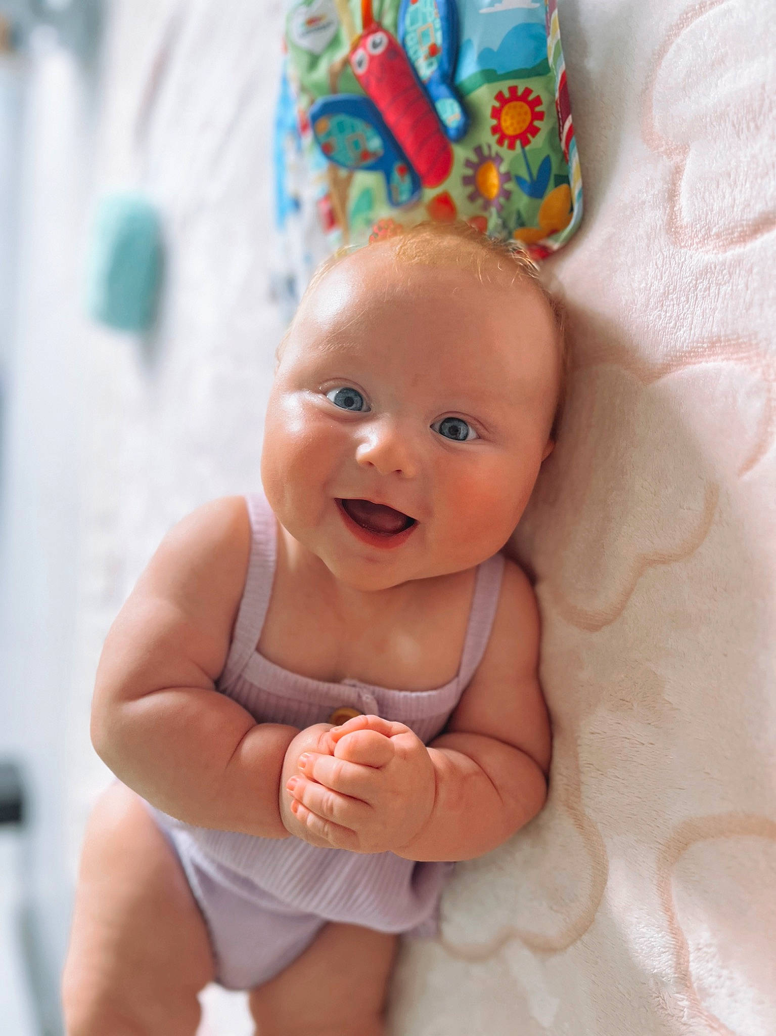 Ayva is registered to the contest to win money with this photo: baby, baby_toddler_clothing, cheek, chin, eye, face, finger, gesture, happy, head, iris, mouth, nose, person, pink, skin, smile, stomach, textile, toddler