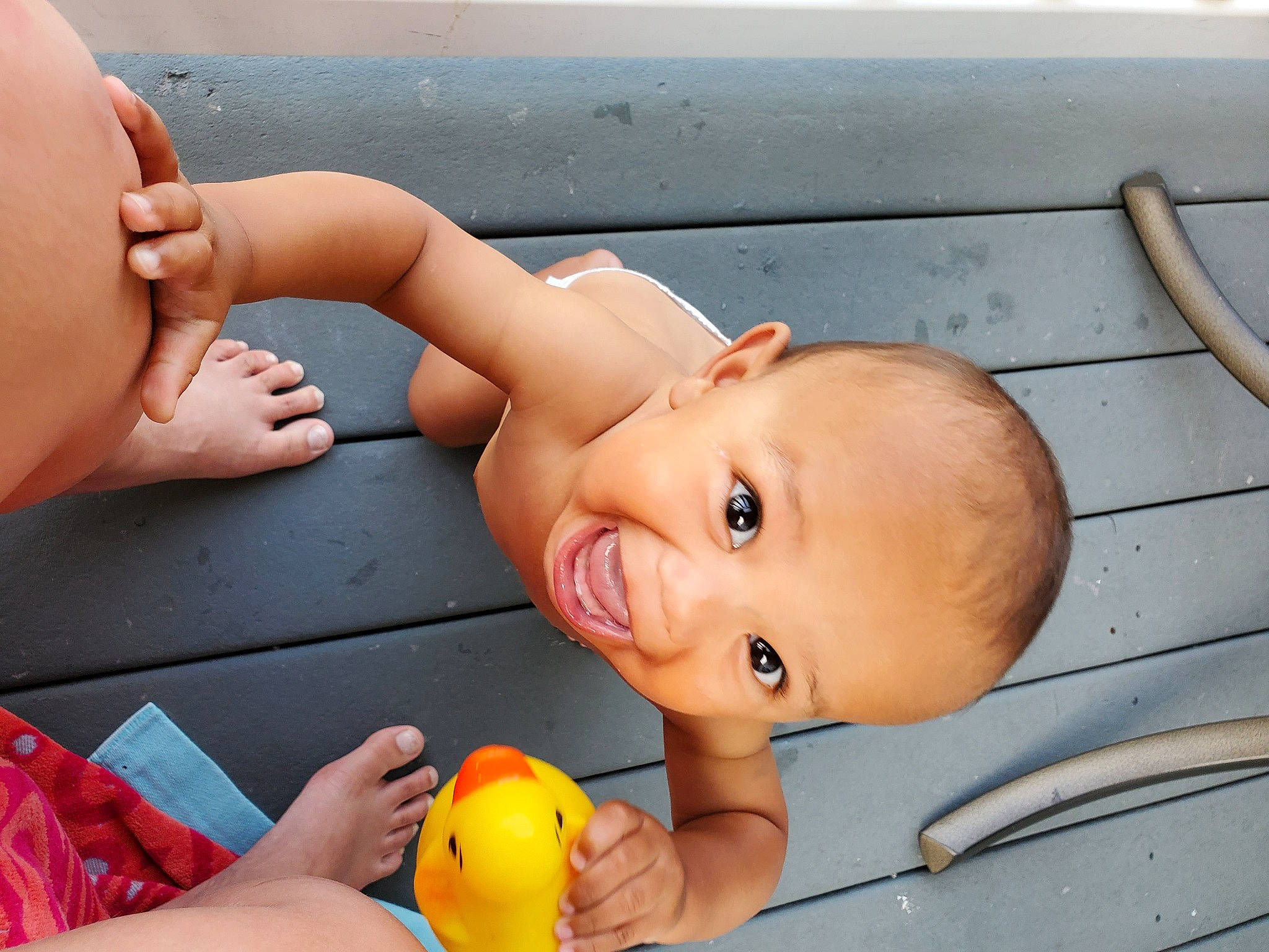 Lucian is registered to the contest to win money with this photo: arm, cheek, chin, eyelash, facial_expression, hairstyle, hand, happy, head, joint, lip, mouth, muscle, neck, nose, orange, organ, person, product, skin