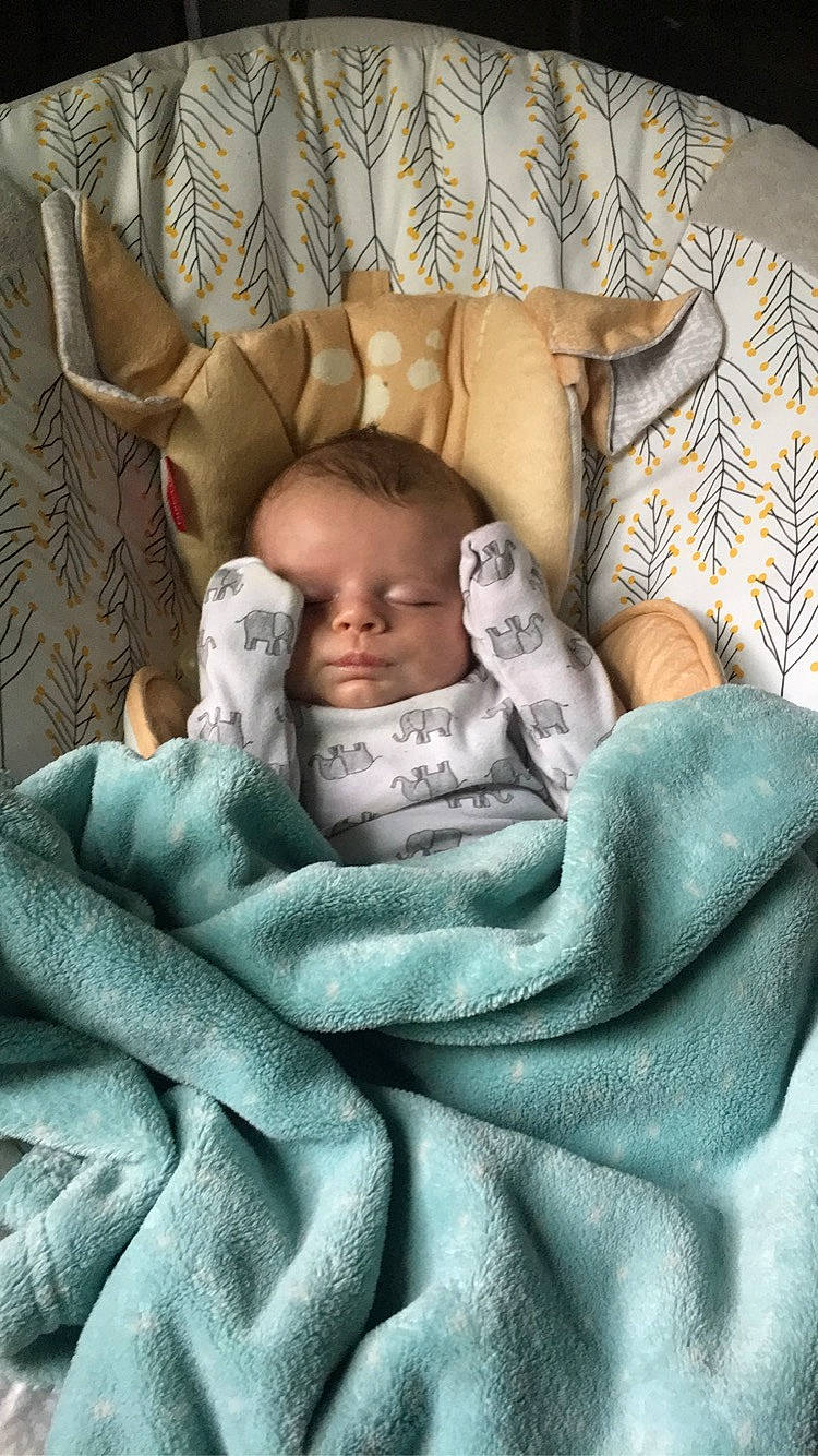 Liam is registered to the contest to win money with this photo: baby, baby_products, baby_sleeping, bed, bed_sheet, bedding, bedtime, blanket, child, comfort, fur, head, linens, nap, person, room, sleep, textile, throw_pillow, toddler