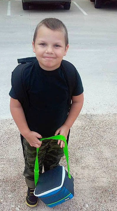 Terryn is registered to the contest to win money with this photo: asphalt, denim, electric_blue, fun, grass, happy, human_leg, joy, knee, pattern, person, personal_protective_equipment, recreation, rock_climbing_equipment, shorts, sleeve, smile, sportswear, sweatpant, t_shirt