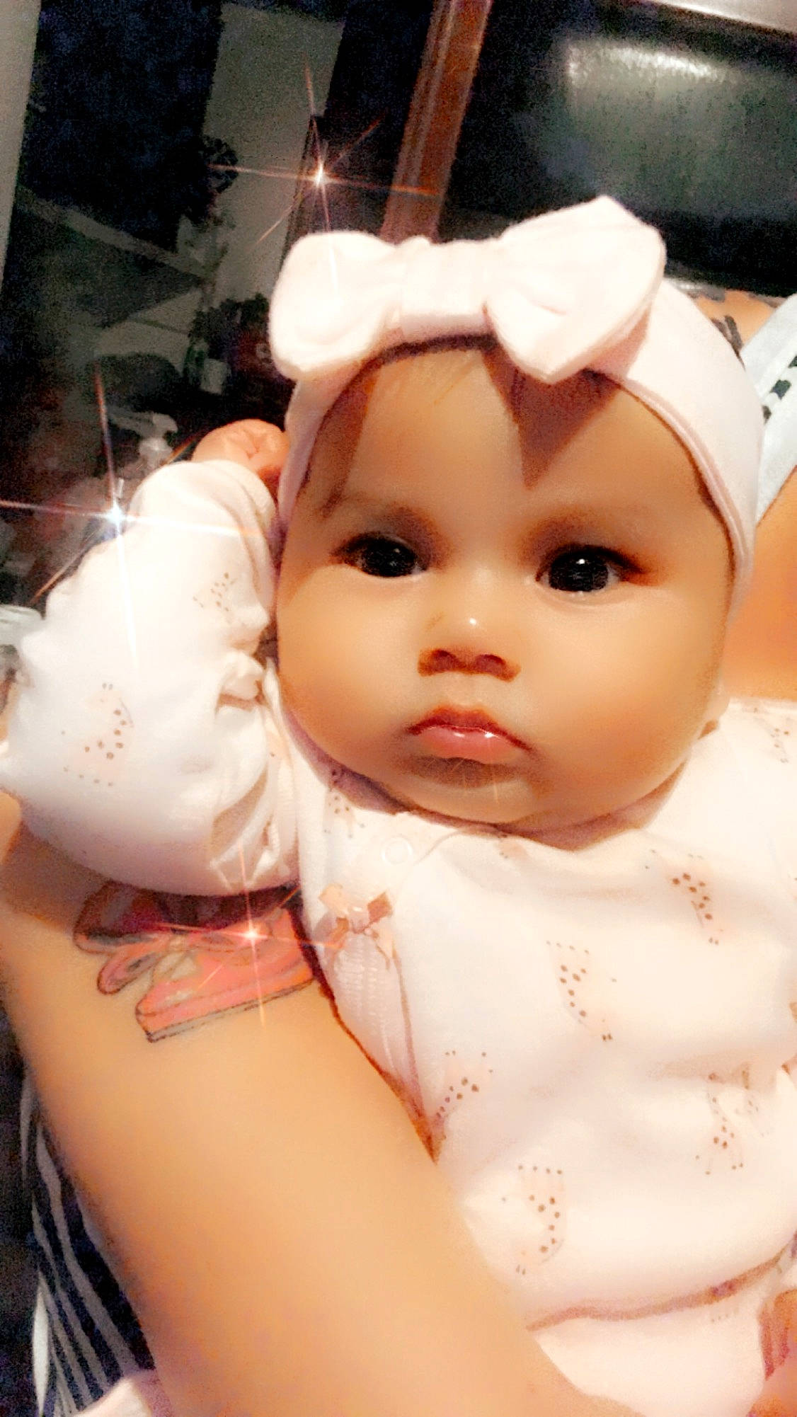 Aunastacia is registered to the contest to win money with this photo: baby, cheek, child, doll, face, head, headwear, person, skin, toddler, toy