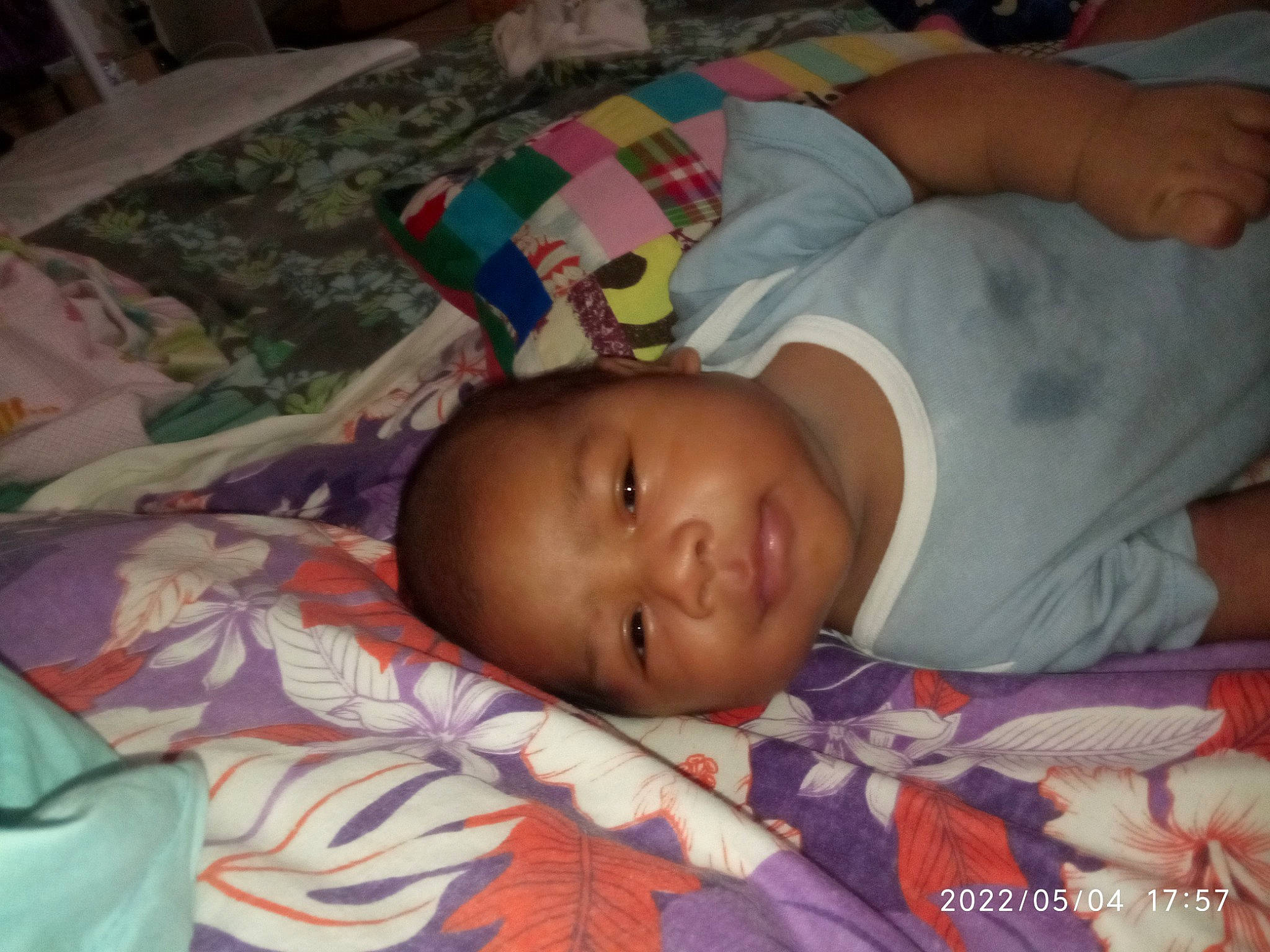 Tyson Manureva Raphaël Teivao a rejoint le concours — aidez-le/la à gagner de superbes lots ! baby, baby_products, baby_toddler_clothing, bedtime, cheek, child, comfort, forehead, fun, happy, iris, linens, mouth, nap, nose, person, room, skin, sleep, smile