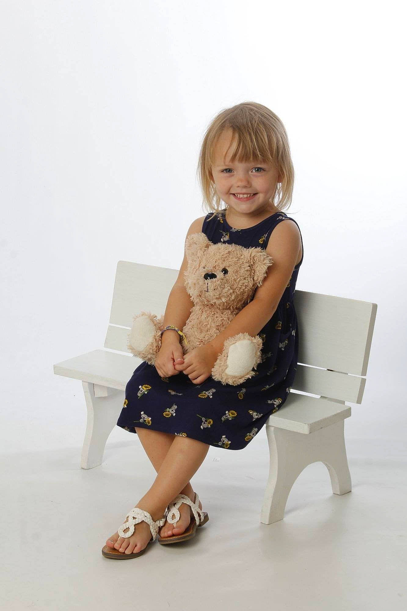Leeana is registered to the contest to win money with this photo: baby_toddler_clothing, day_dress, fashion_design, foot, happy, human_body, human_leg, joint, joy, knee, leg, pattern, person, sandal, shoe, shoulder, skin, sleeve, smile, thigh