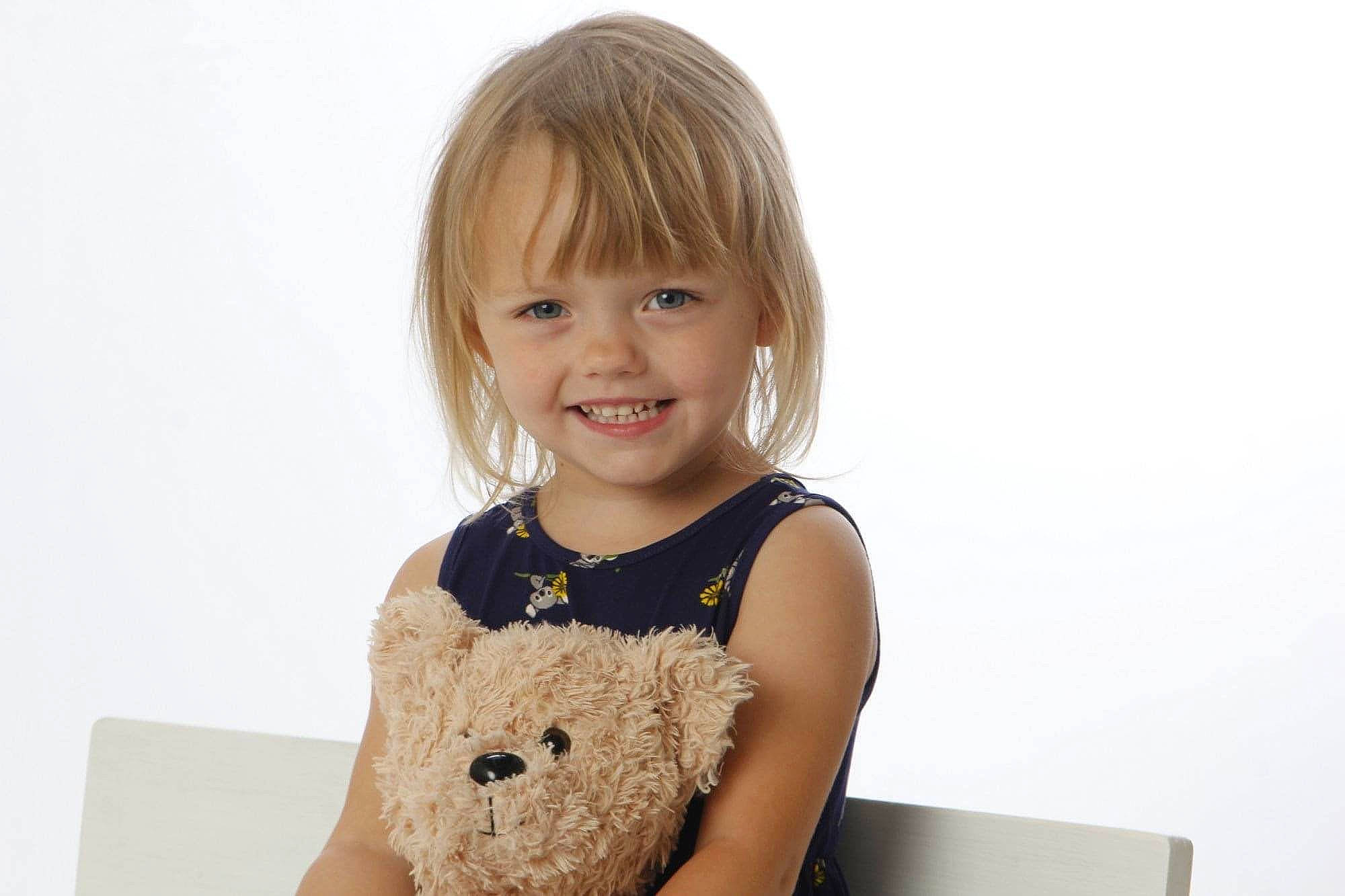 Leeana is registered to the contest to win money with this photo: baby, baby_toddler_clothing, cheek, child, clothing, collar, day_dress, dress, face, fun, happy, head, joy, neck, one_piece_garment, outerwear, pattern, person, sleeve, smile