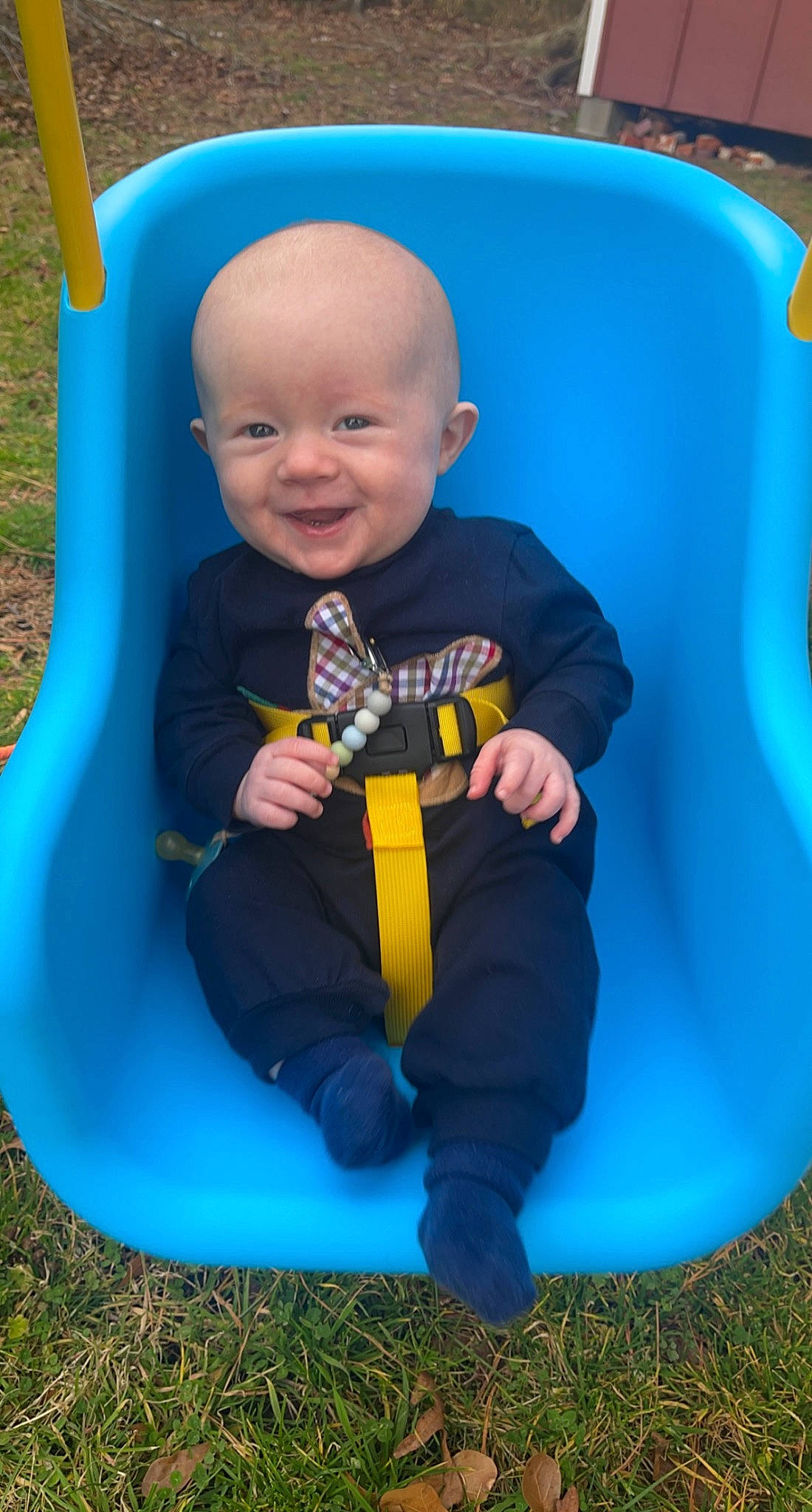 Harlow joined the competition — help win amazing prizes! baby, baby_toddler_clothing, child, chute, city, comfort, electric_blue, facial_expression, fun, grass, green, happy, inflatable, leisure, outdoor_play_equipment, person, playground, recreation, sitting, smile