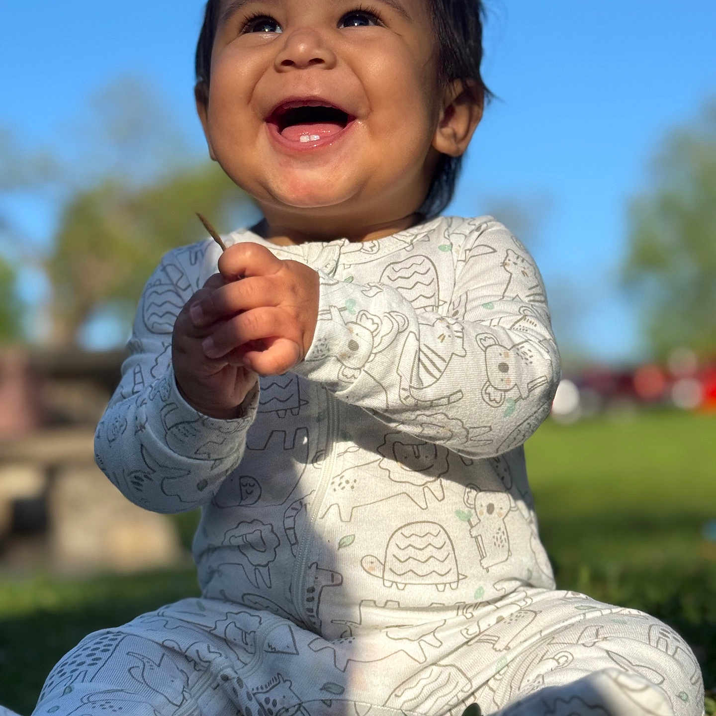 Gustavo Mellado joined the competition — help win amazing prizes! baby, babylaughing, bodypart, clothing, dress, face, finger, grass, hand, happy, head, laughing, mouth, person, photography, plant, portrait, sitting, smile, teeth