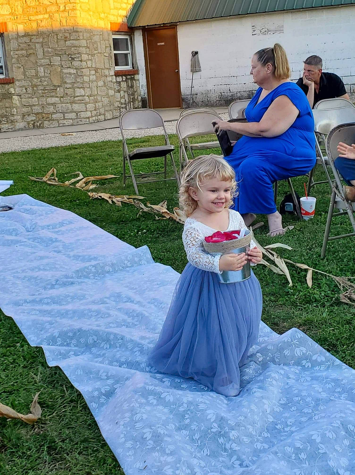 Karmen joined the competition — help win amazing prizes! bridal_clothing, chair, child, door, event, formal_wear, fun, gown, grass, hairstyle, happy, joy, lawn, leisure, person, petal, pole, recreation, smile, toddler