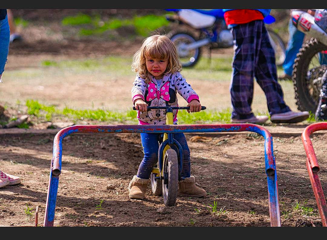 Karmen joined the competition — help win amazing prizes! automotive_tire, bicycle_frame, bicycle_handlebar, bicycle_tire, child, city, fun, grass, leisure, outdoor_play_equipment, people_in_nature, person, plant, play, playground, recreation, soil, tire, toddler, tree
