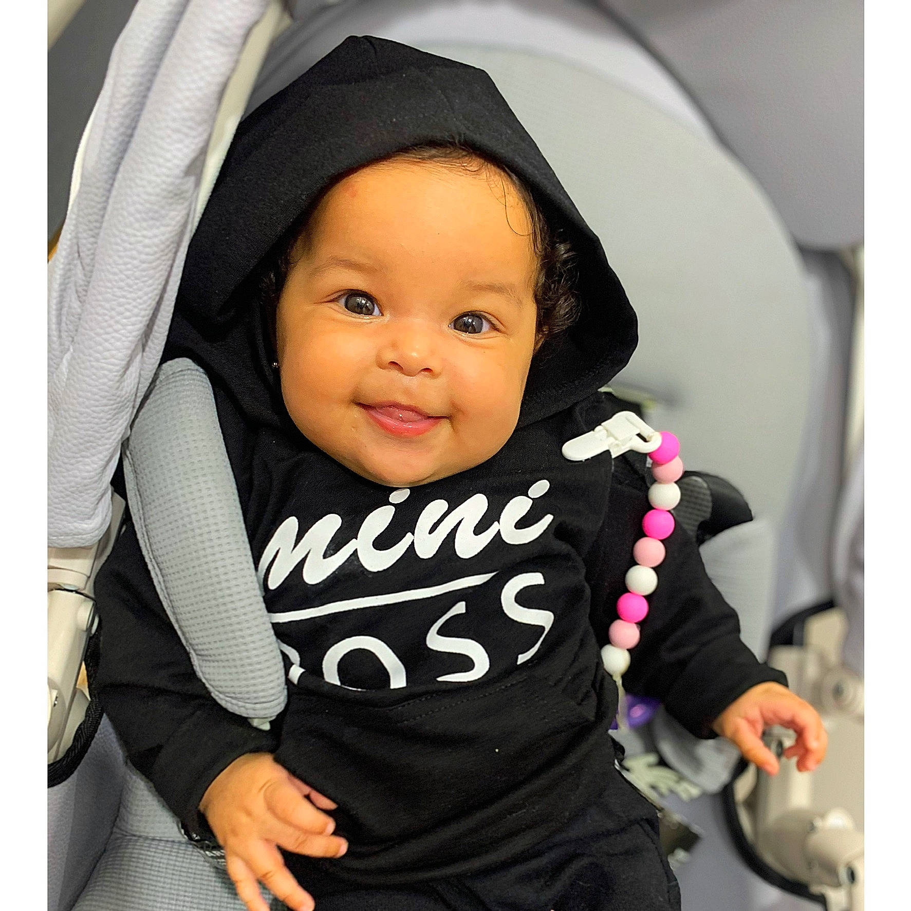 Kinsley joined the competition — help win amazing prizes! baby, baby_carriage, baby_in_car_seat, baby_products, baby_toddler_clothing, black, car_seat, cheek, comfort, cool, eyebrow, face, gesture, happy, head, headwear, joy, outerwear, person, product