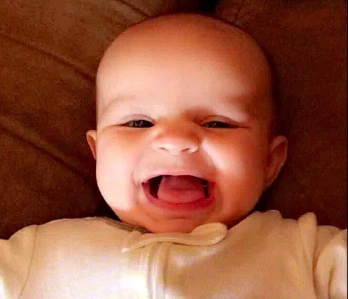 Kyla is registered to the contest to win money with this photo: baby, baby_making_funny_faces, cheek, comfort, ear, eyelash, gesture, happy, human_body, jaw, lip, mouth, nose, person, shout, smile, sweetness, toddler, tongue, tooth