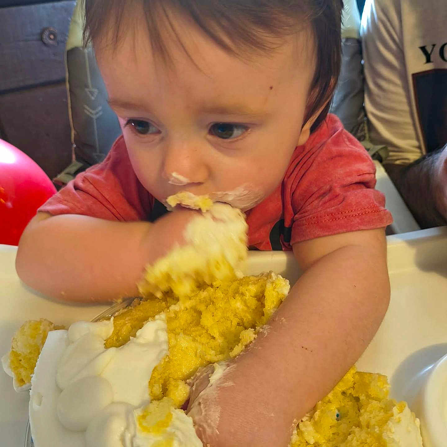 Dreyden is registered to the contest to win money with this photo: birthday, cake, celebration, child, closeup, cream, eating, face, food, frosting, hands, happy, highchair, indoor, messy, person, red, shirt, toddler, yellow