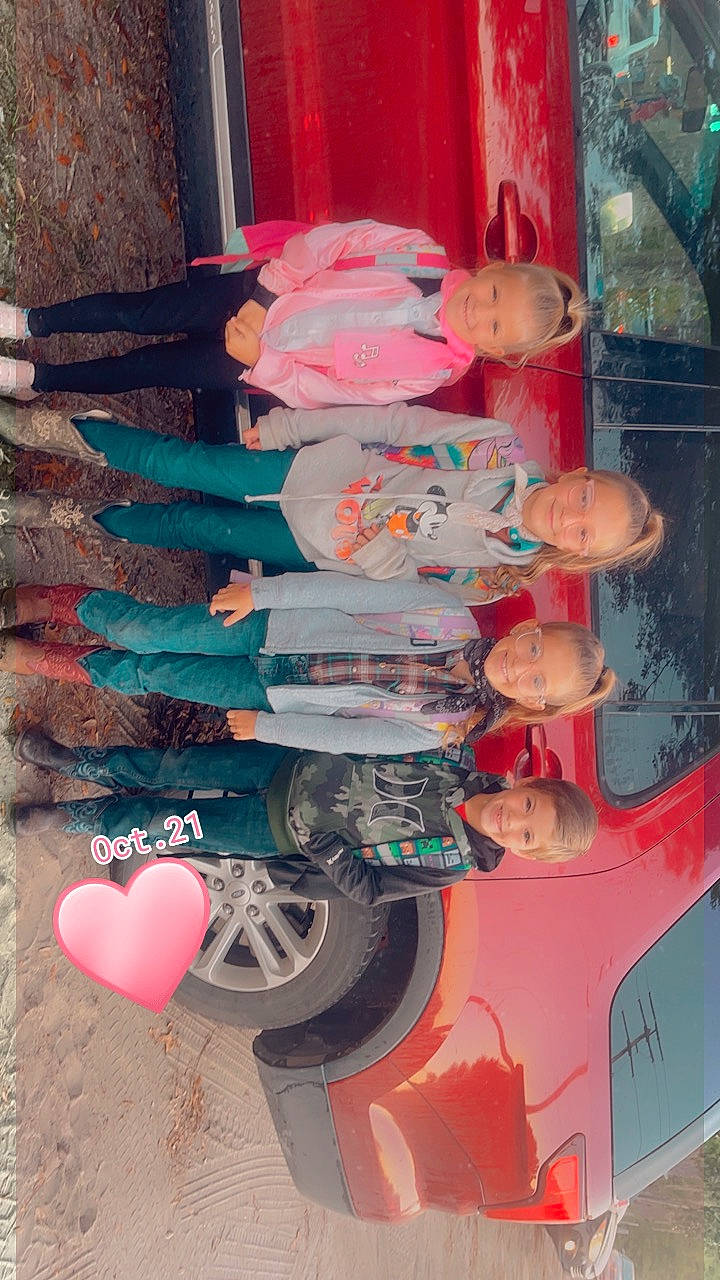 Katherine is registered to the contest to win money with this photo: automotive_design, automotive_exterior, automotive_lighting, automotive_tire, automotive_wheel_system, electric_blue, family_car, fun, joy, magenta, motor_vehicle, orange, peach, person, pink, plastic, red, smile, textile, tire