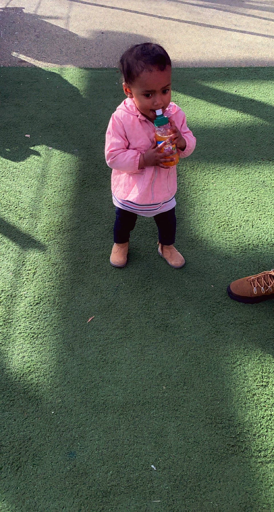 Grayce participe au concours pour gagner de l'argent avec cette photo : baby, baby_toddler_clothing, barefoot, eye, finger, floor, flooring, foot, gesture, grass, hand, human_body, people_in_nature, person, recreation, skin, sleeve, thumb, tints_and_shades, toddler