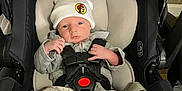 Jace joined the competition — help win amazing prizes! baby, infant, car_seat, hat, clothing, socks, straps, safety, indoor, person, cute, newborn, seated, car_seat_harness, expression, small, soft, blanket, comfort, headwear