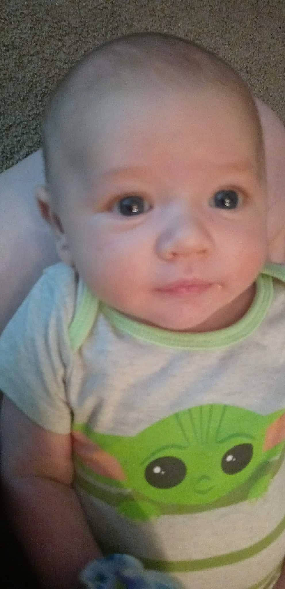 Dexter is registered to the contest to win money with this photo: baby, baby_toddler_clothing, cheek, child, chin, eyebrow, eyelash, facial_expression, forehead, grass, happy, iris, lip, mouth, nose, organ, person, skin, sleeve, t_shirt