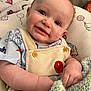 Matteo Peter Noel is registered to the contest to win money with this photo: baby, smile, drool, blanket, overalls, balloon_patch, cushion, pattern, elephant, balloon, cute, child, infant, clothing, hand, face, eyes, indoor, soft, cozy