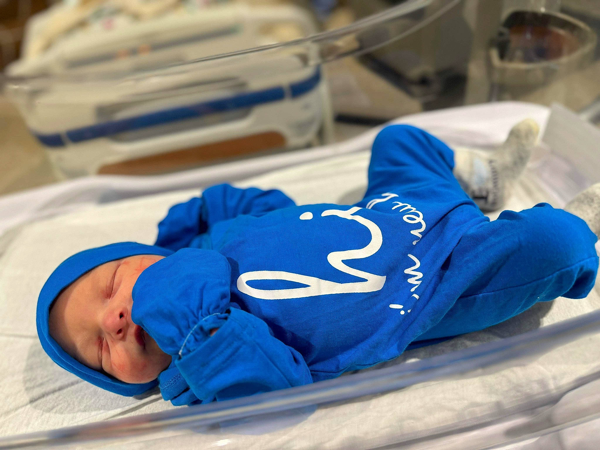 Rayn joined the competition — help win amazing prizes! athletic_shoe, baby, carmine, child, comfort, electric_blue, font, hat, headwear, linens, paint, person, plastic, room, sitting, sportswear, toddler, walking_shoe