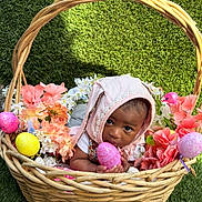 Sianni joined the competition — help win amazing prizes! baby, basket, bonnet, clothing, daisy, egg, face, flower, flowerarrangement, flowerbouquet, food, grass, hat, head, person, petal, photography, plant, portrait, purple