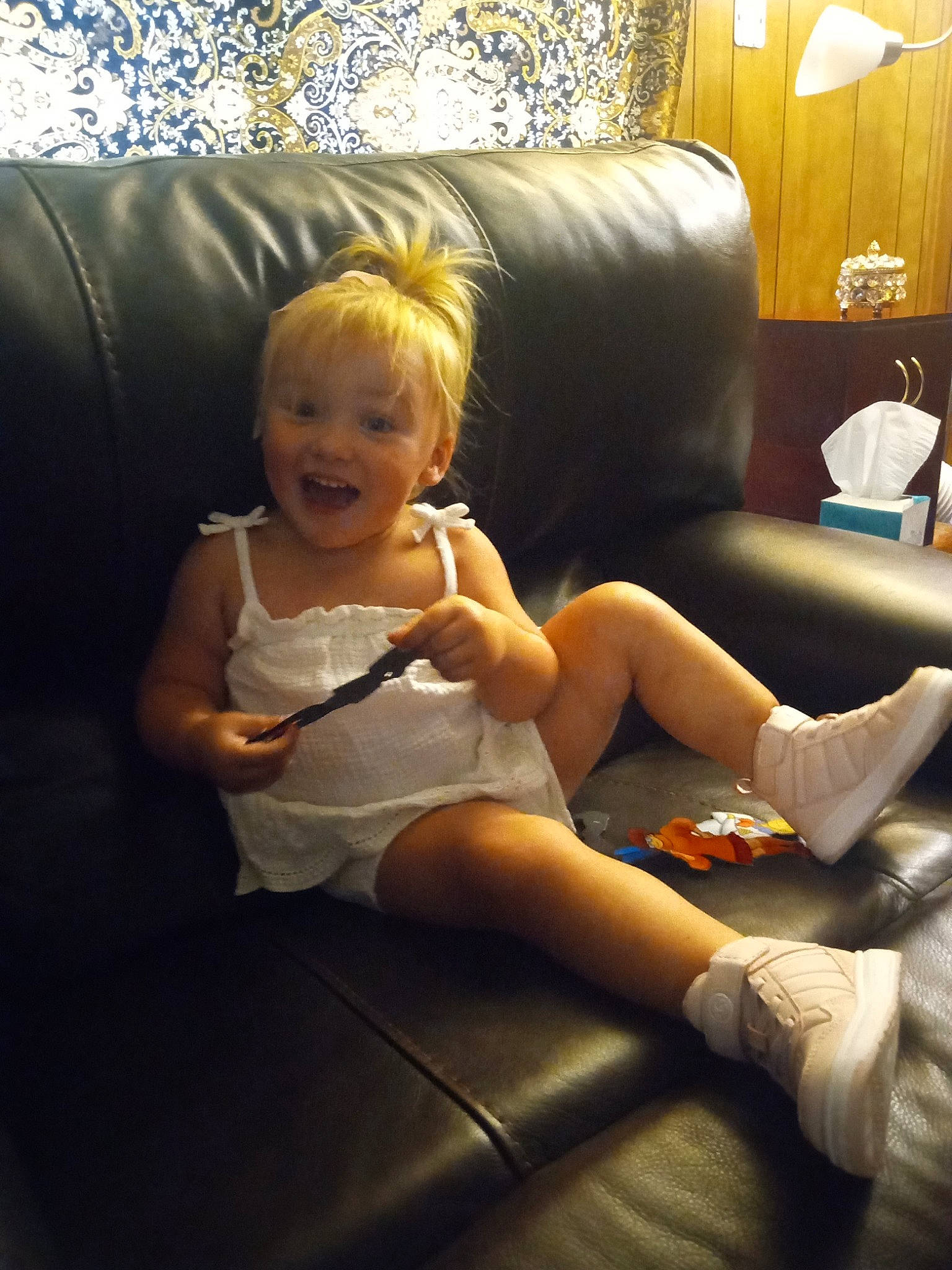 Macie joined the competition — help win amazing prizes! blond, comfort, couch, eye, floor, flooring, fun, human_leg, joy, knee, lamp, lap, leg, living_room, person, picture_frame, room, sitting, smile, thigh