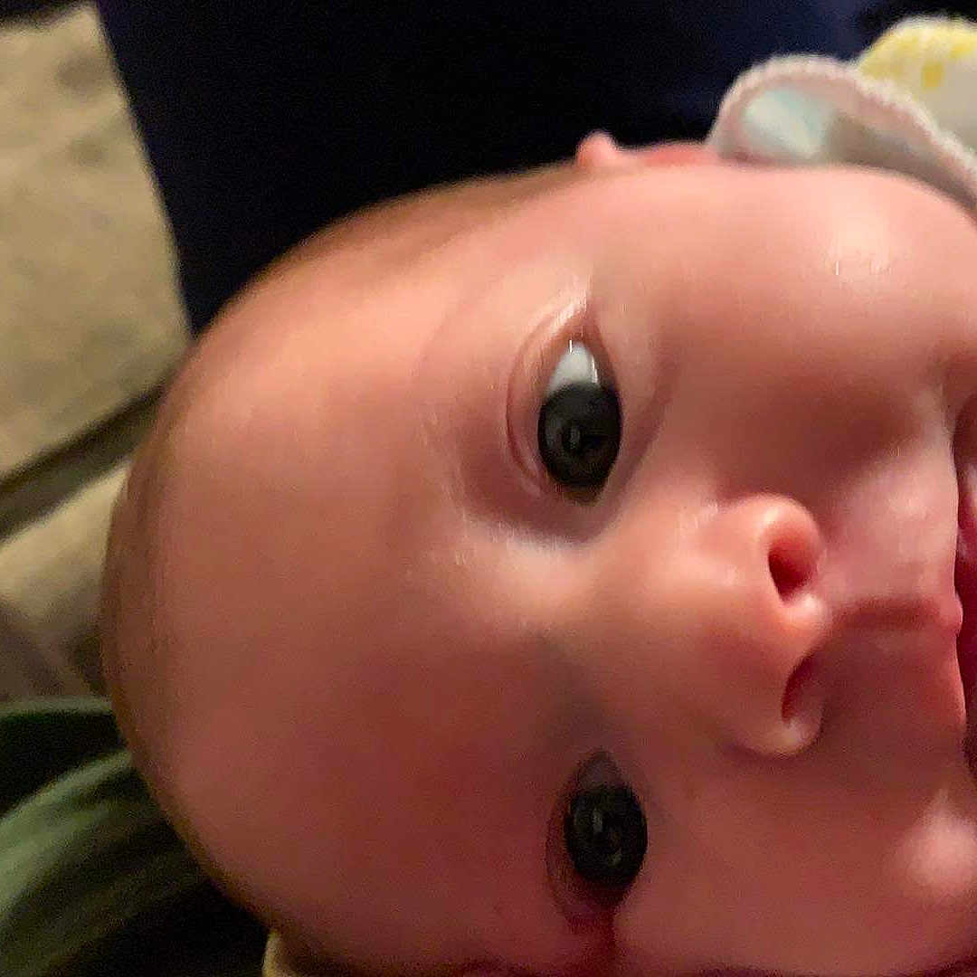 Athena is registered to the contest to win money with this photo: baby, cheek, chin, ear, eye, eyebrow, eyelash, finger, flash_photography, forehead, hair, hairstyle, happy, head, iris, lip, mouth, nose, skin, smile