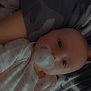 Bryce joined the competition — help win amazing prizes! baby, bed, bedroom, blanket, clothing, couch, crib, dress, face, furniture, head, infantbed, newborn, person, photography, portrait, quilt, sleeping, t_shirt, toy