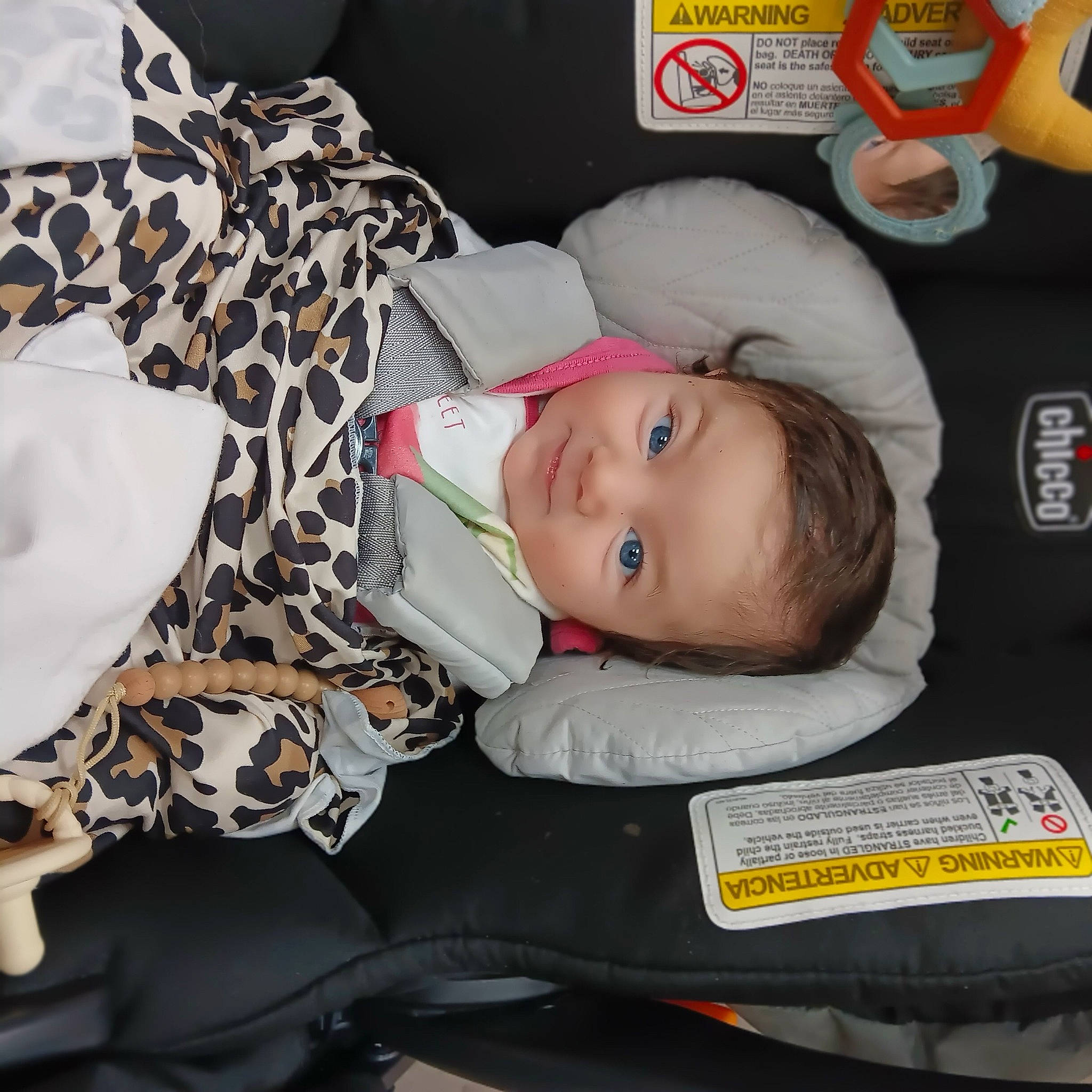 Madelyne joined the competition — help win amazing prizes! baby, baby_carriage, baby_products, baby_safety, baby_toddler_clothing, car_seat, child, comfort, pattern, person, room, sleeve, smile, toddler