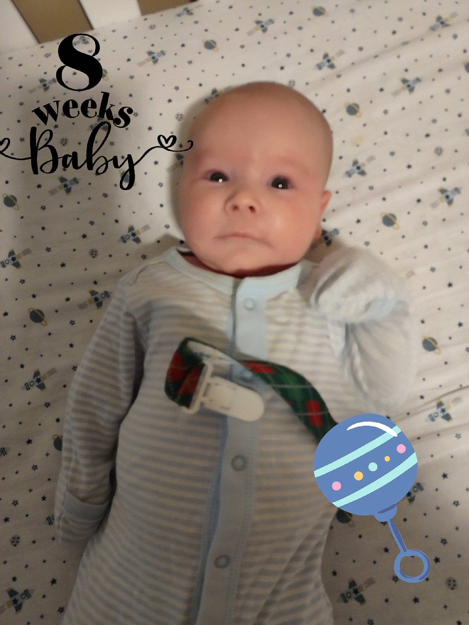 Simon is registered to the contest to win money with this photo: baby, baby_products, baby_toddler_clothing, child, cleanliness, collar, comfort, eye, handwriting, happy, pattern, person, product, room, sleeve, textile, toddler
