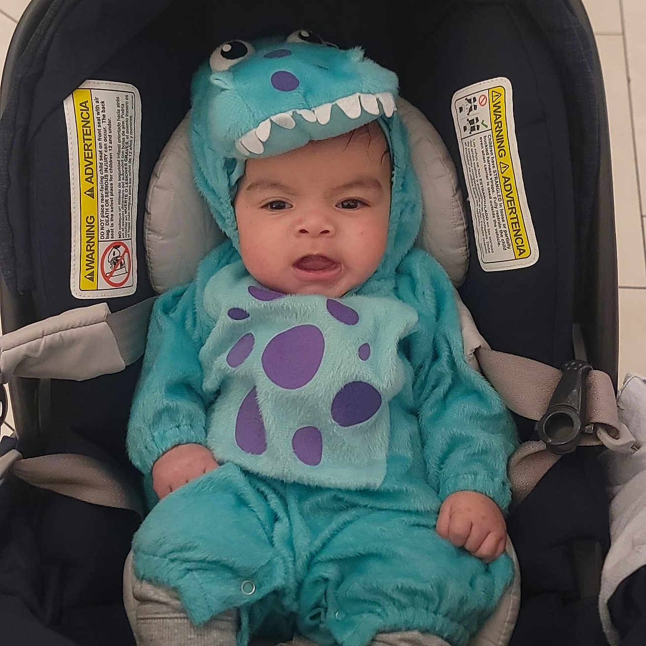 Jeremy joined the competition — help win amazing prizes! adorable, baby, baby_clothes, blue, car_seat, child, clothing, costume, cute, expression, face, headwear, indoor, infant, portrait, purple_spots, seatbelt, sitting, smiling, young_child
