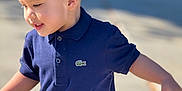 Joel Hernandez is registered to the contest to win money with this photo: child, boy, smiling, blue_polo_shirt, short_hair, outdoor, leaf, jeans, sunlight, happy, casual_clothing, portrait, daylight, playful, cute, person, young, toddler, side_view, nature