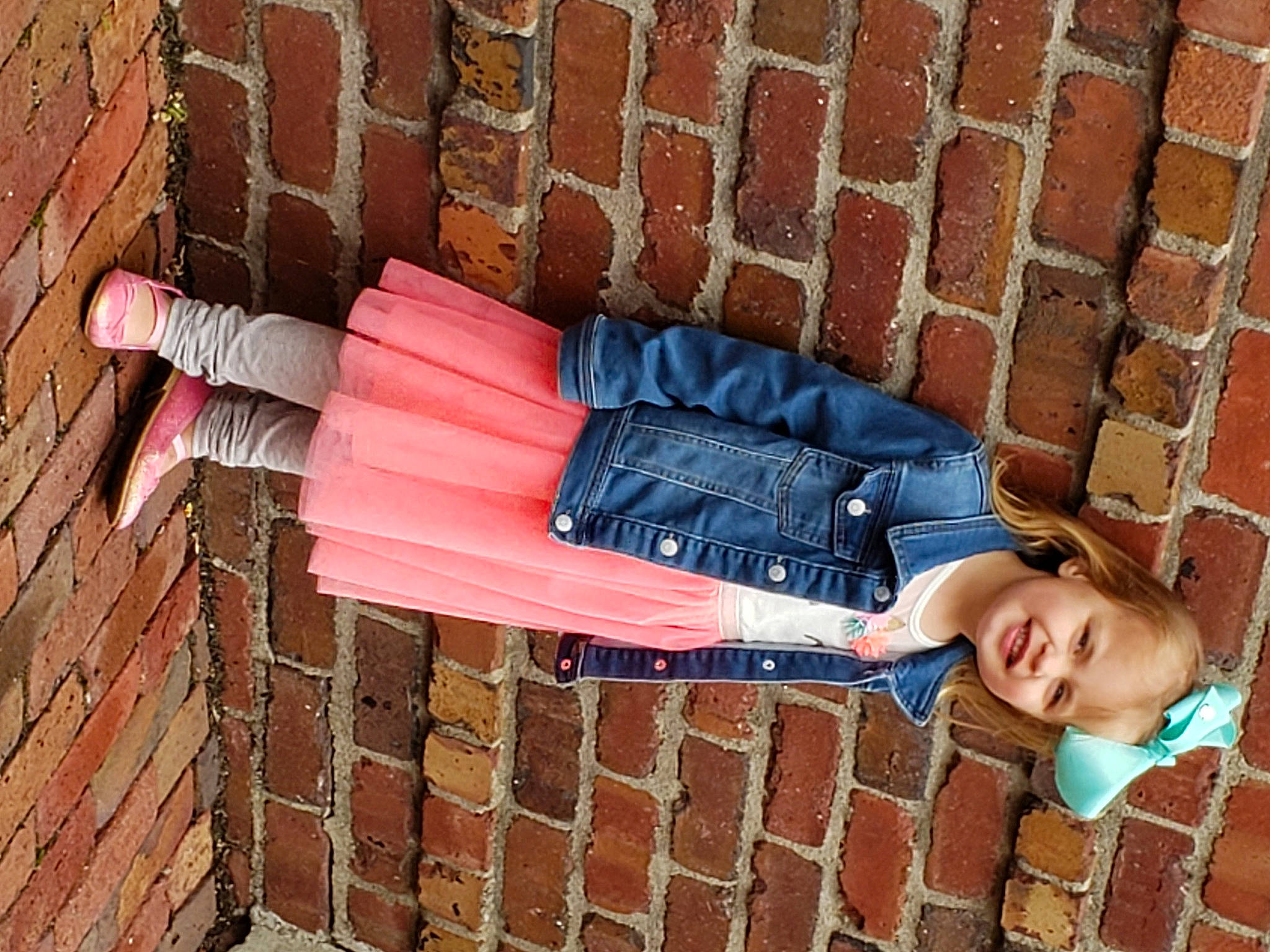 Leianna joined the competition — help win amazing prizes! brick, brickwork, hand, jeans, joy, leg, person, photography, textile, wall